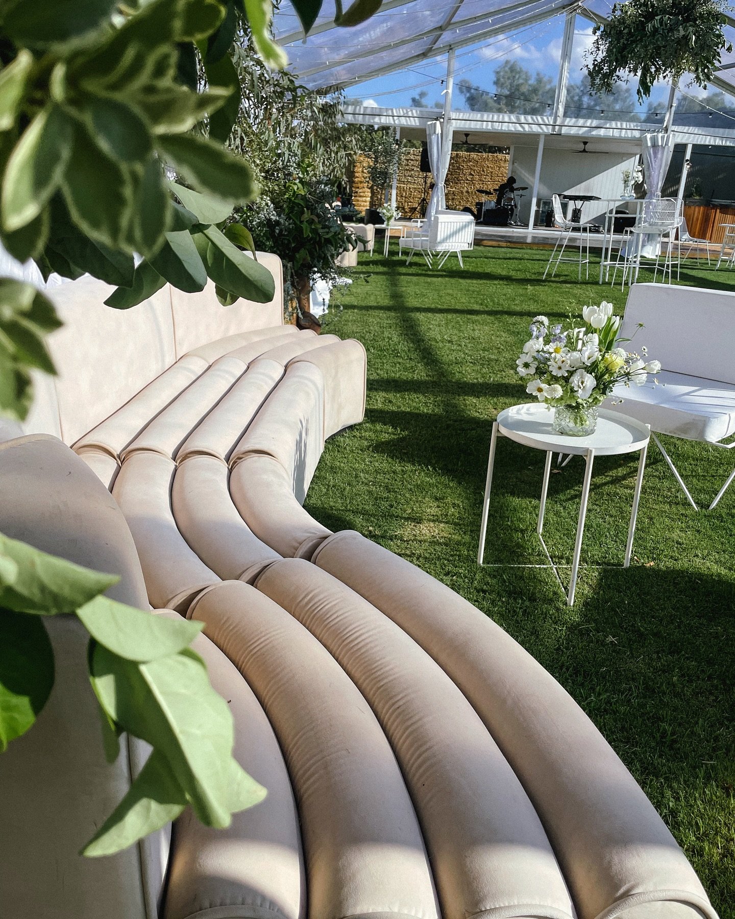 You&rsquo;re sipping a cocktail, golden hour is glowing, and this is your lounge set up&hellip;

A dreamy blend of our curved velvet lounge + resort-style white armchairs &mdash; we love mixing + matching our styles.

Which seat are you sliding into 