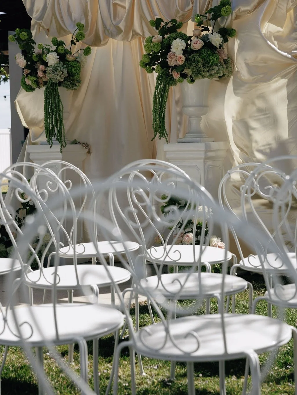 Soft draping, sculptural florals and a fresh garden palette &mdash; the dreamiest ceremony moment brought to life by Pretty Party Co ✨

Our Amelie Garden Chairs added that touch of European romance, creating a light and airy space for guests to gathe