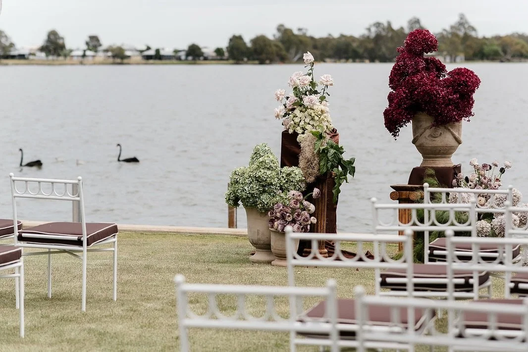 This colour palette is everywhere right now and we&rsquo;re not mad about it.

Chocolate tones paired with soft florals and a ceremony by the water at Silverwoods Resort Yarrawonga create a look that feels warm, modern and effortlessly elegant.

A be