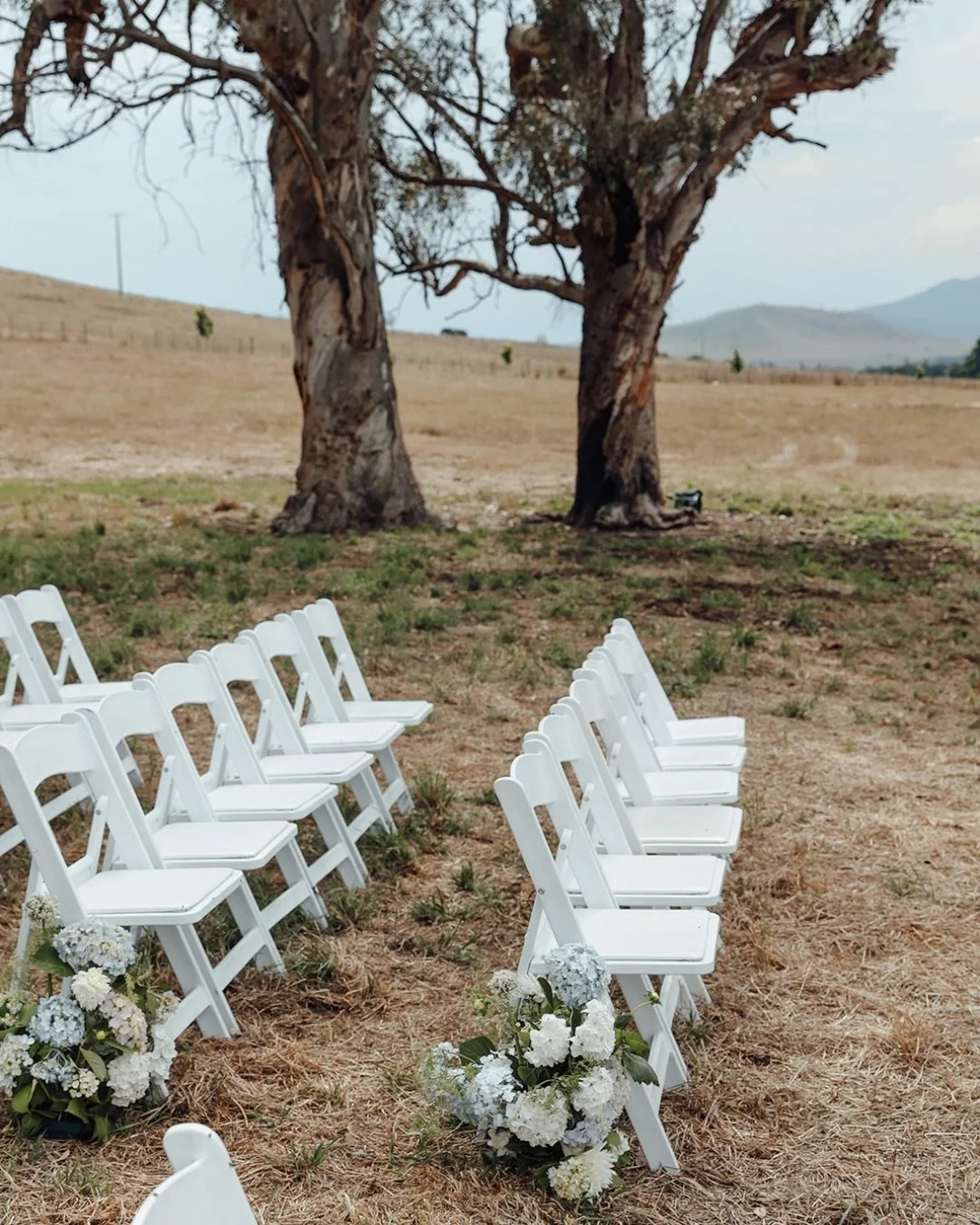 When the setting is this good, you don&rsquo;t need to compete with it 🤍

Claire &amp; Skeet married on the family farm, ceremony beneath an old gum tree in the middle of a paddock and reception back on the homestead lawn. 

Beautiful but not overdo