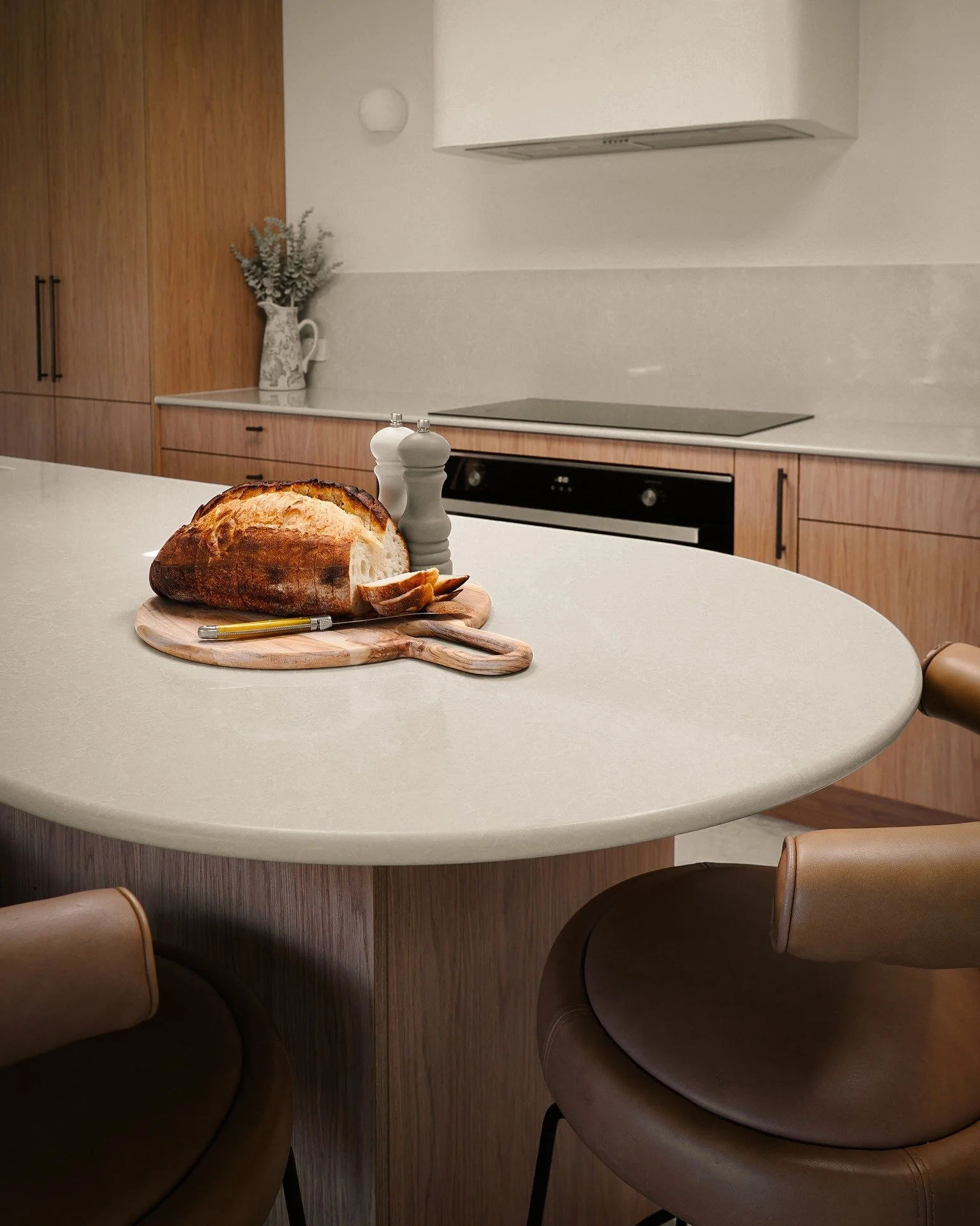Soft, organic curves form an inviting focal point, encouraging relaxed conversation and connection during meal prep.

#tradewindsdesign #interiordesign  #bespokecabinetry #kitchendesıgn #goldcoastinteriors #luxurydesign #queenslandhomes