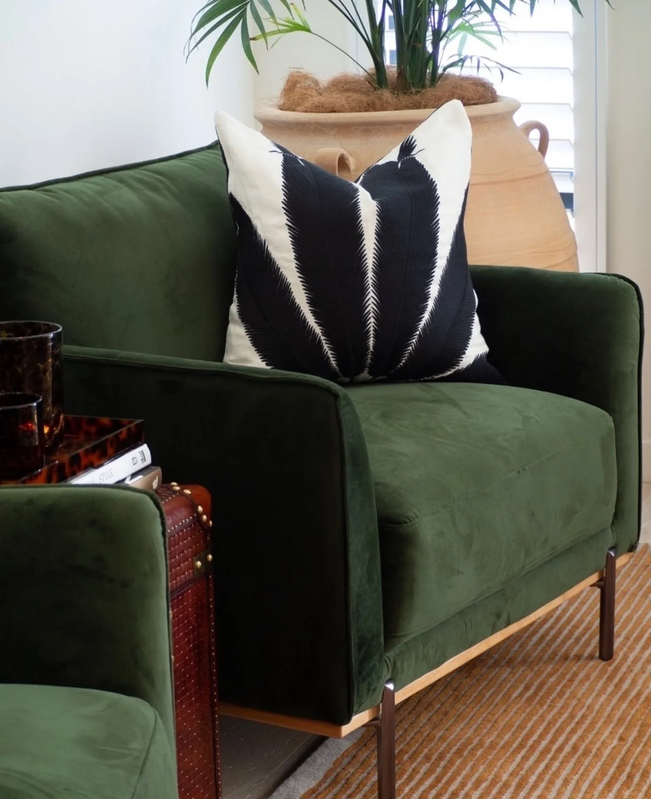 Inspired by the famous Raffles Singapore, 'The Cigar Room' holds the owners collection of curiosities from their travels abroad.

Our project at Mermaid Waters on the Gold Coast features curved linear design in saturated tones of deep forest green, b