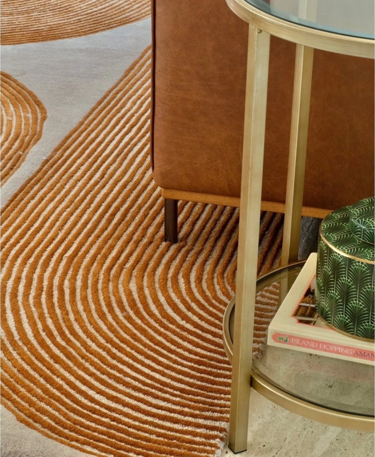 Continuing the curves with this burnt bronze and bone coloured wool rug.

#tradewindsdesign #interiordesign  #floorrug #goldcoastinteriors #luxurydesign #queenslandhomes #australianinteriordesign #BoldInteriors #luxuryhomedesign