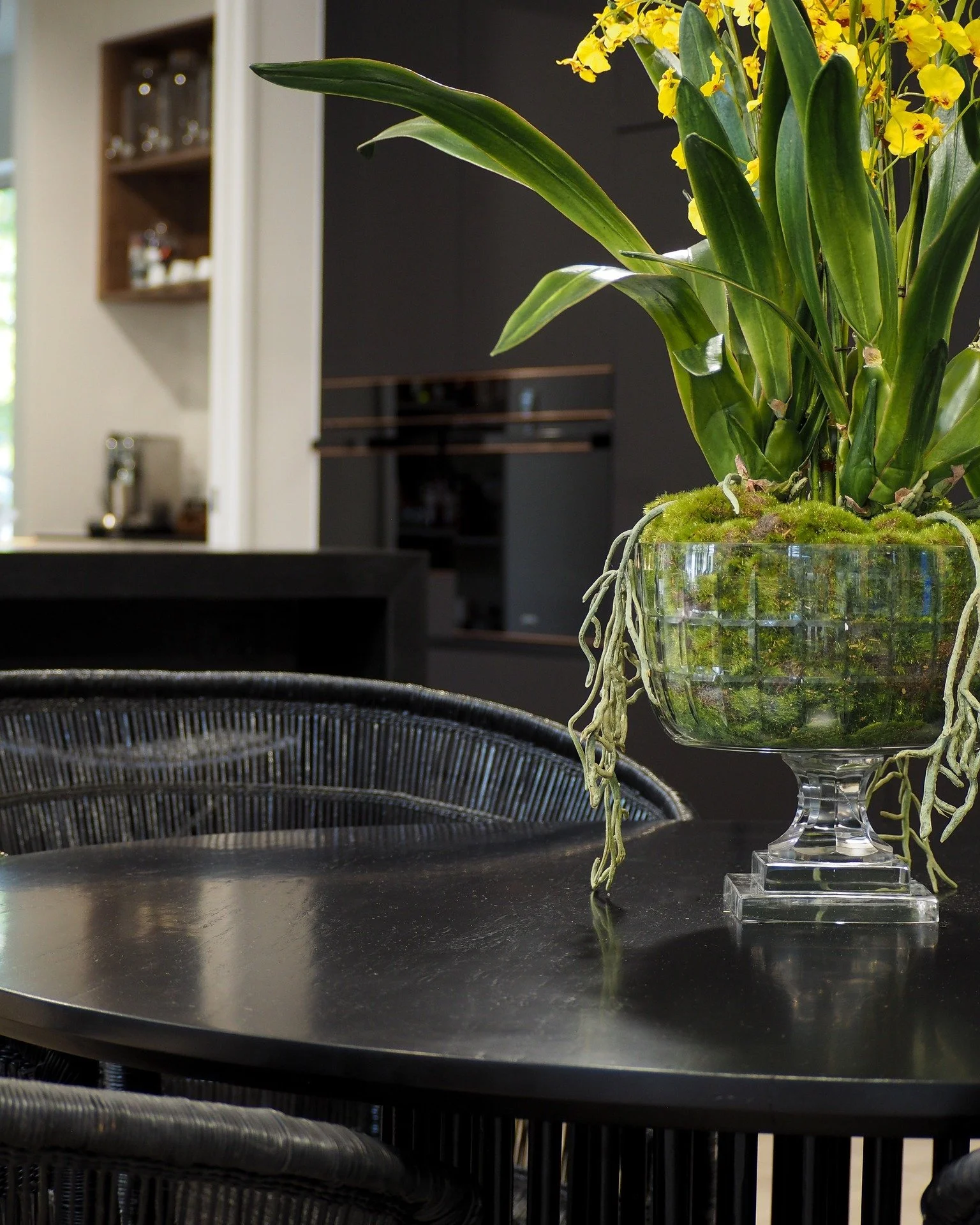 Faux flowers are my go-to for show-stopping centrepieces - atop dining tables, entry tables, master bathroom vanities... yes, they do cost more but you will have them for years and all they need is a wipe down every now and then. No watering required