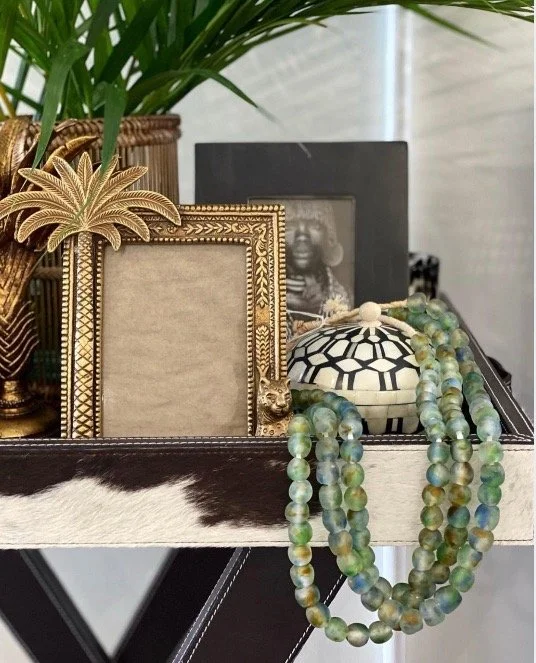 Remember to allow a reasonable amount for accessories in your furnishing budget - this is often what will tie everything together.