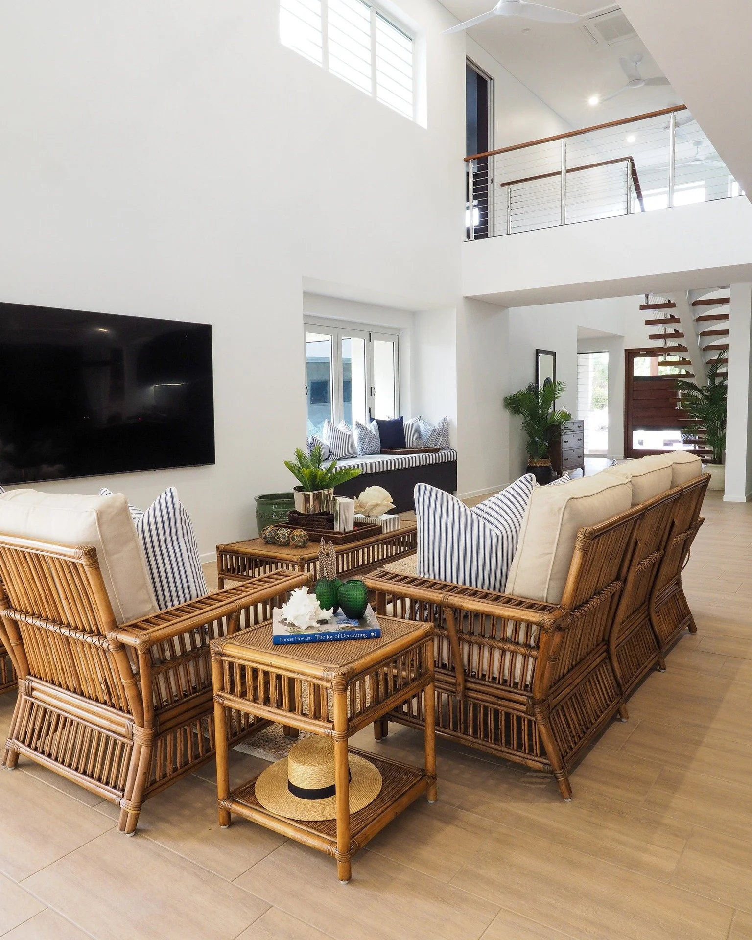 Some spaces are designed to be seen. Others are designed to be lived in.

This Bahamas-inspired setting was thoughtfully curated to bring effortless comfort and refined character into the heart of the home. Layered natural textures, timeless woven fu