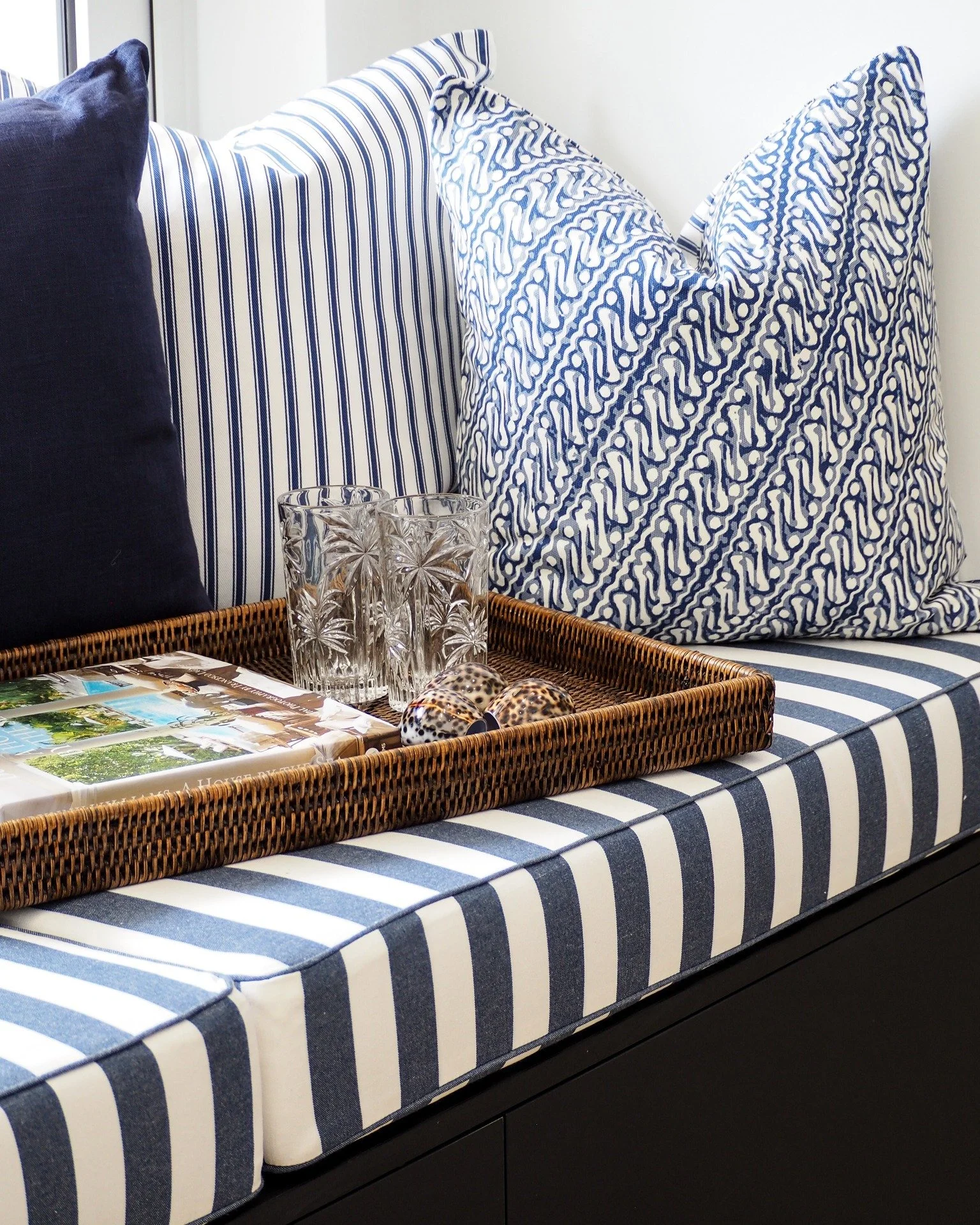 Pattern play in the deep blue shades of the coastline.

#tradewindsdesign #interiordesign #luxuryhomedesign #interiordecorator #interiordecorating ##blueandwhitedecor #stripe #daylounge