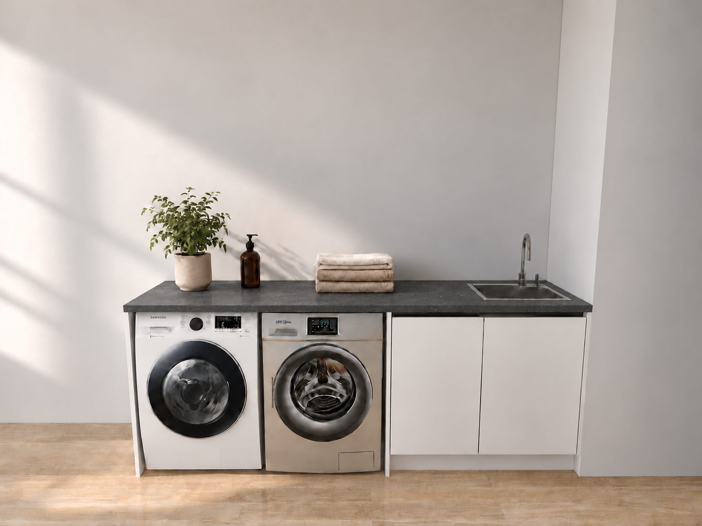 Laundry room with charcoal stone benchtop.png