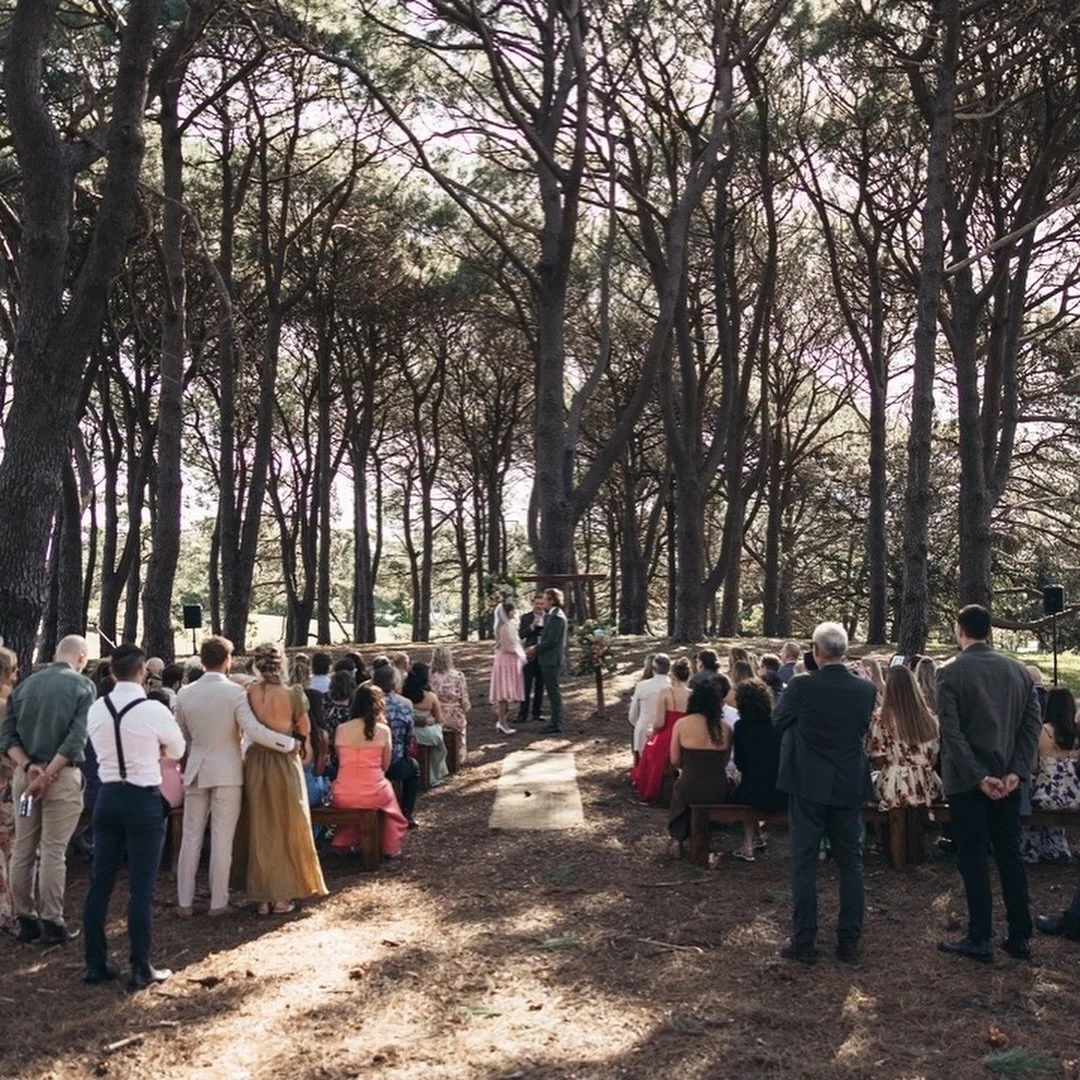 Among the pine trees at Centennial Park, two very good humans made it official.
