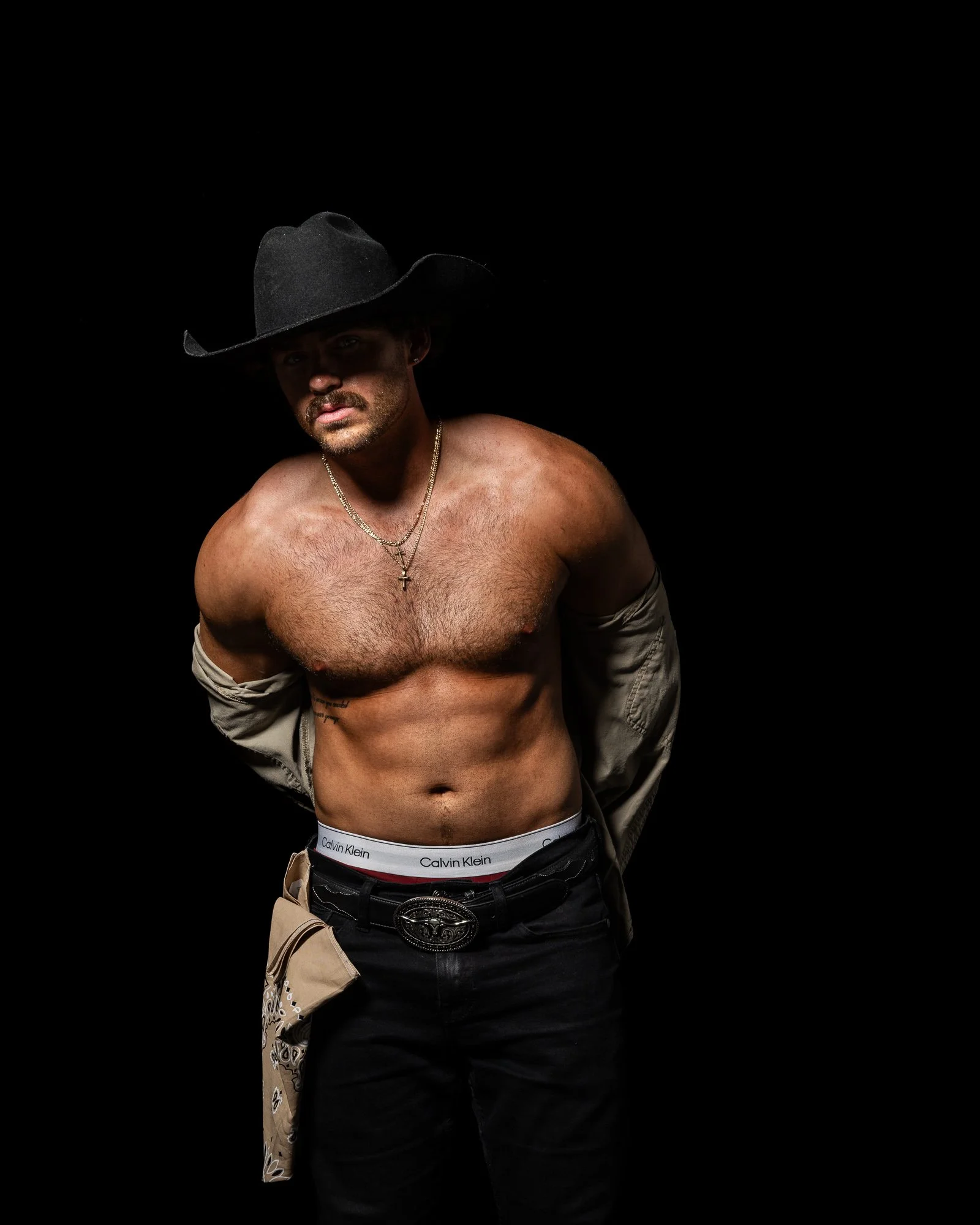 cowboy taking off shirt