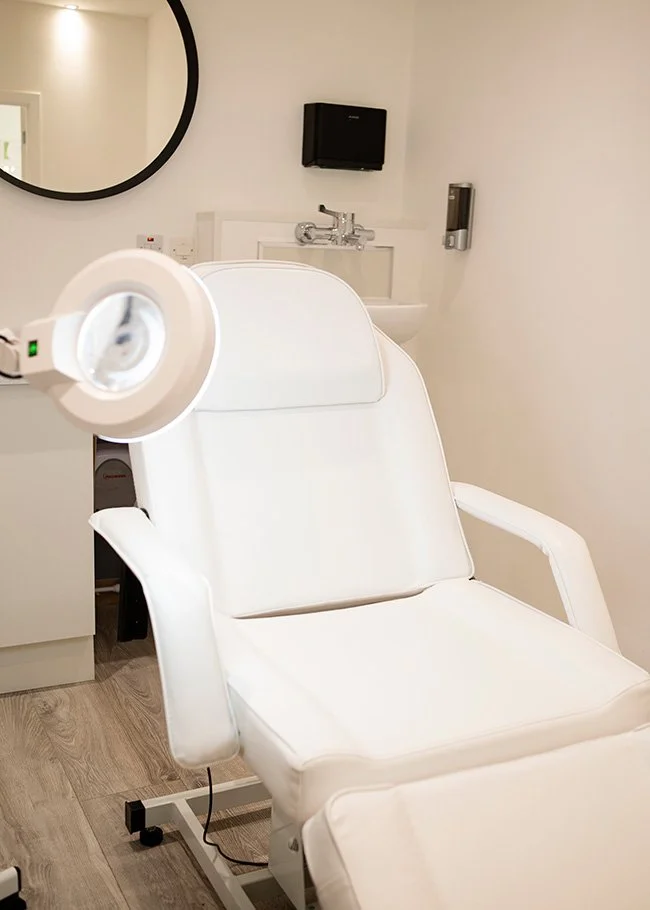 Cream reclining chair in treatment room