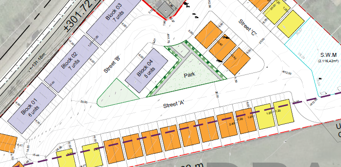 A detailed construction site plan showing blocks, streets, parking, and building layouts with color-coded sections and measurements.