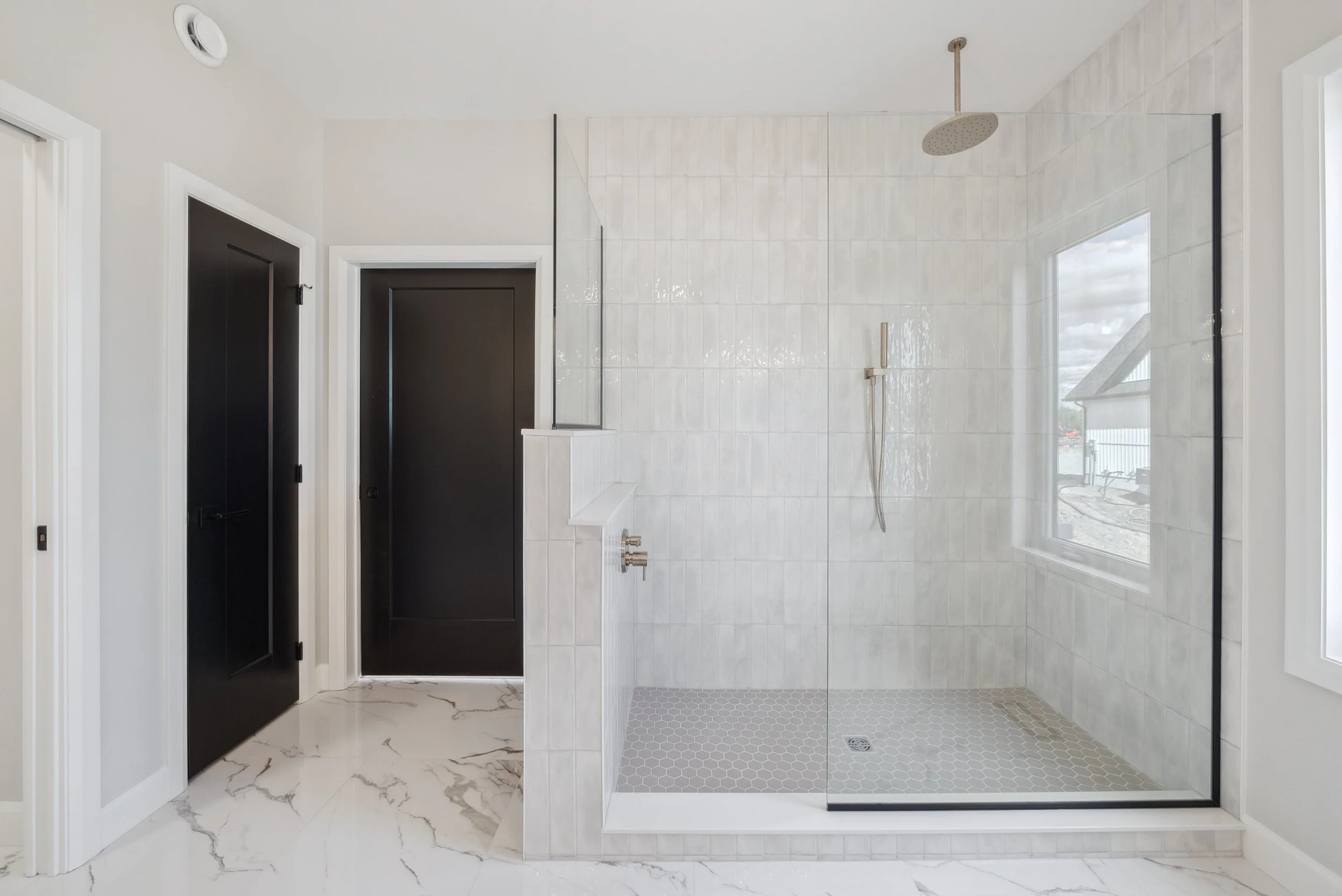 Oversized_Glass_Tile_Shower.jpg
