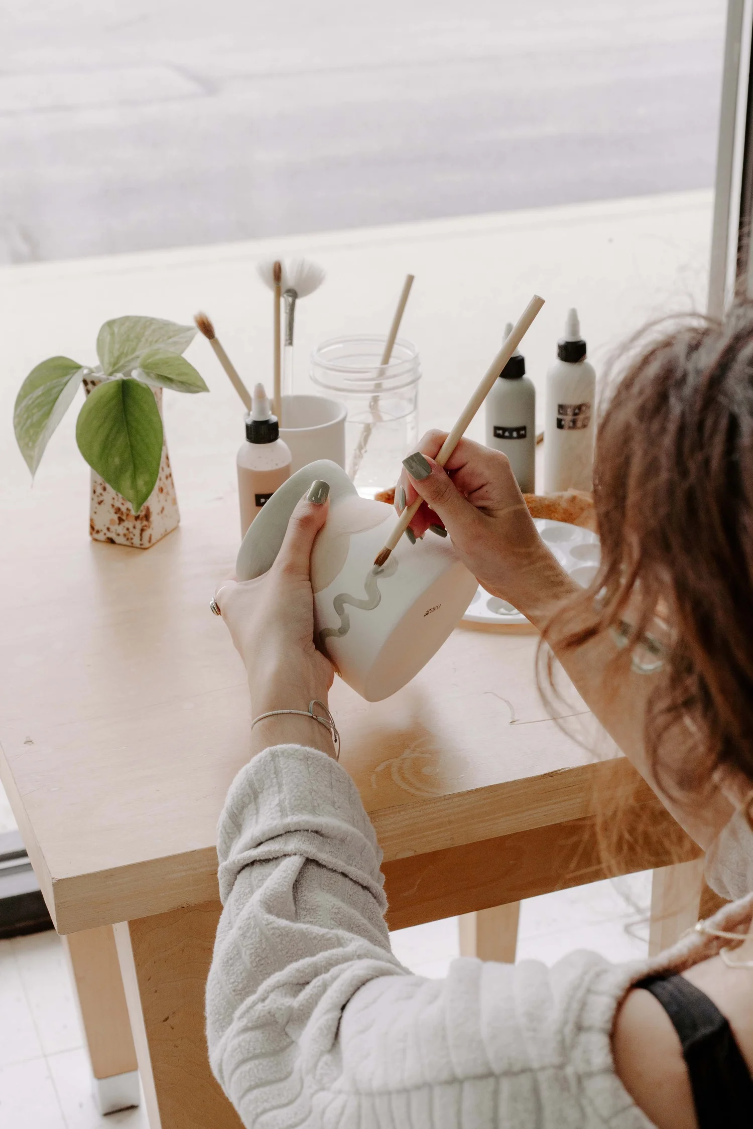 About — Bisque It Pottery Painting Studio
