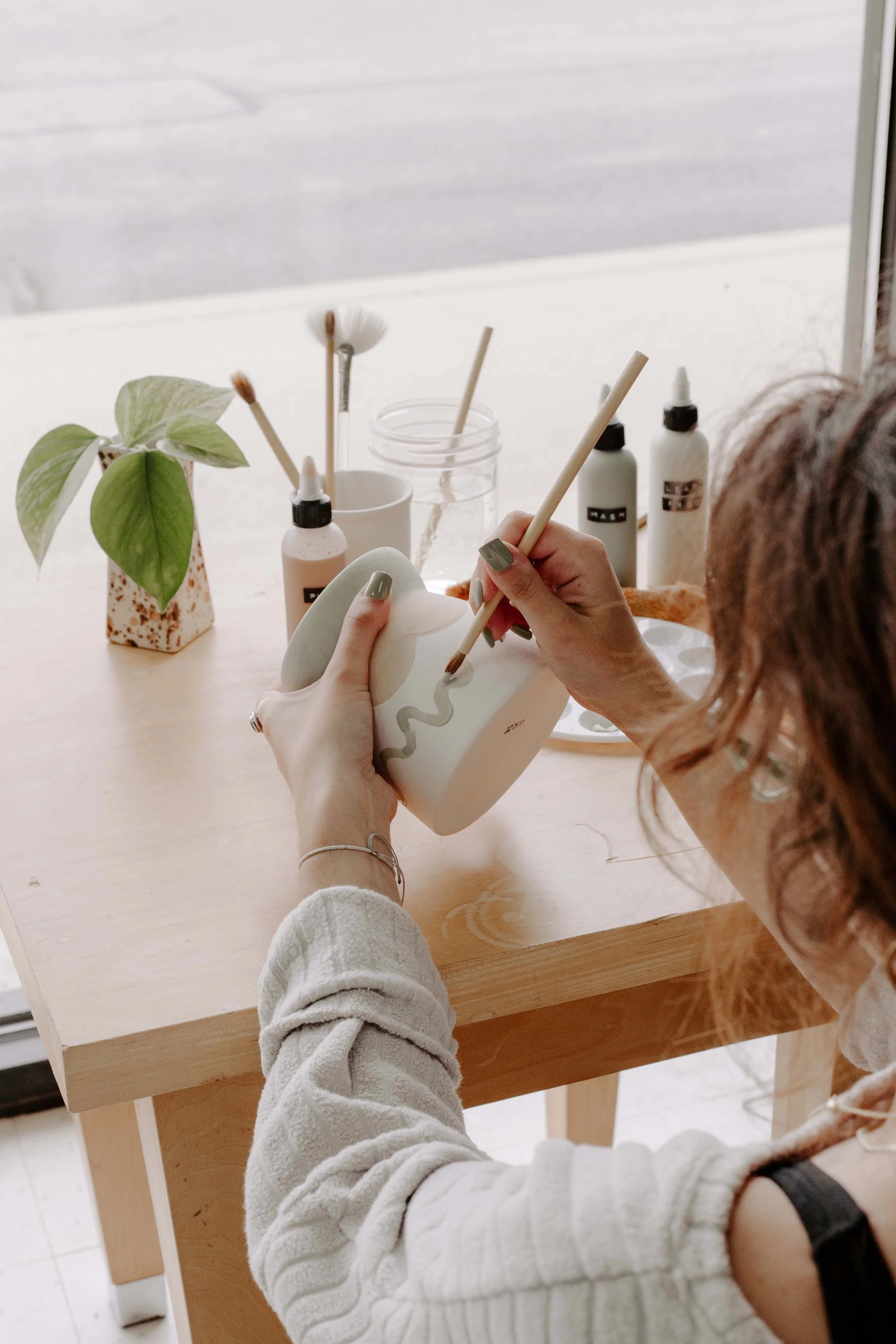 About — Bisque It Pottery Painting Studio