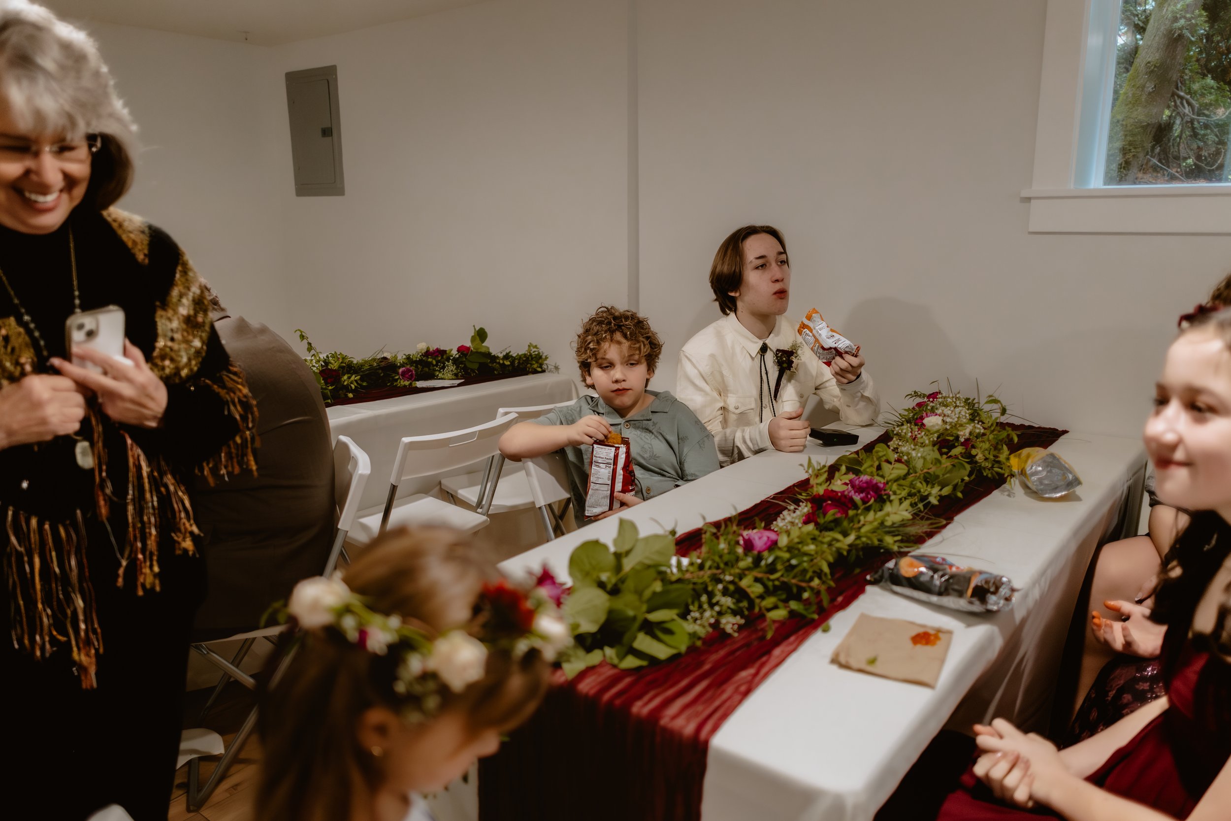 Wedding guests celebrating during an indoor November reception