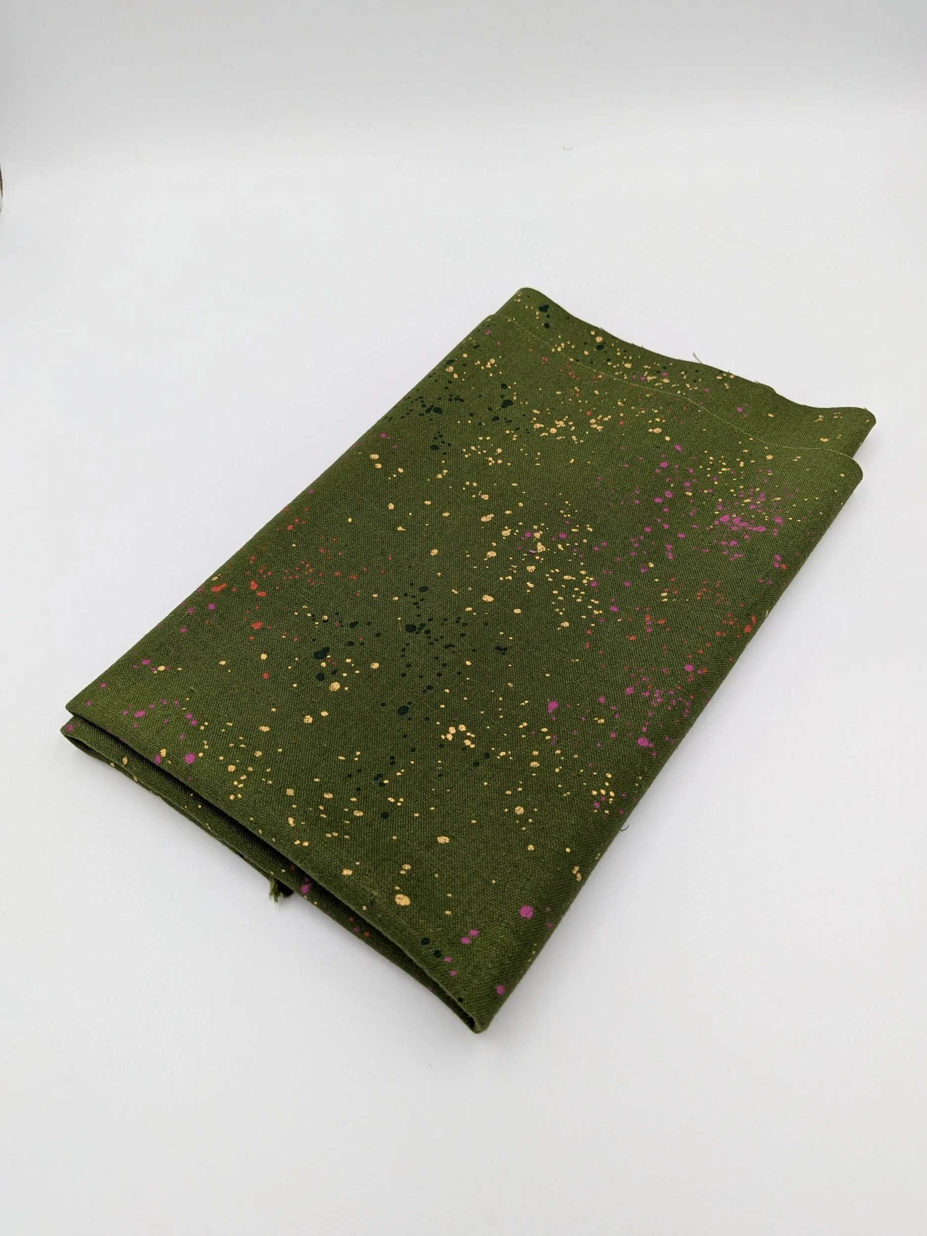 0.5m remnant piece - Ruby Star Speckled Canvas in Sarah Green