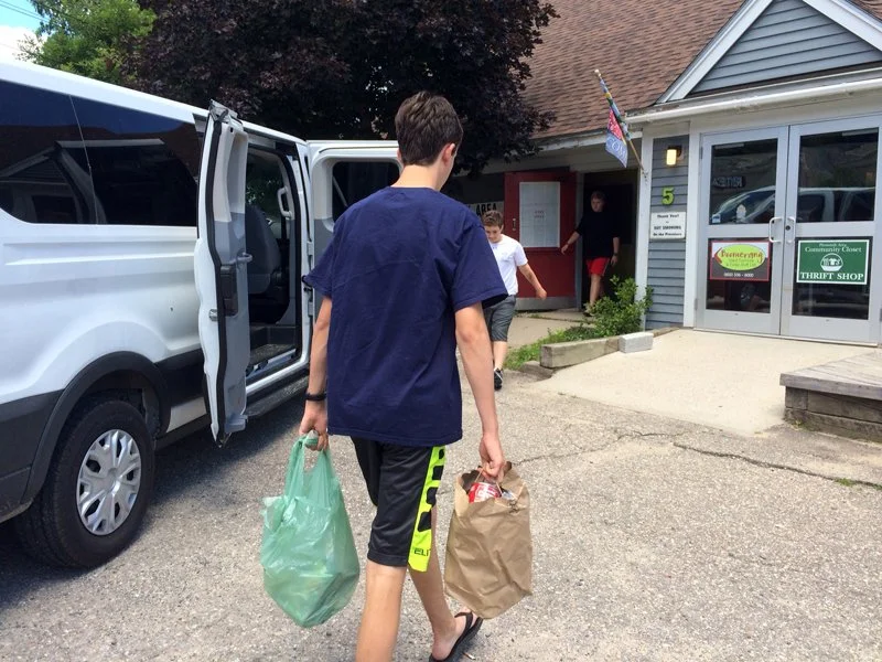 Pemi campers deliver Cans From Campers donations to their local food bank