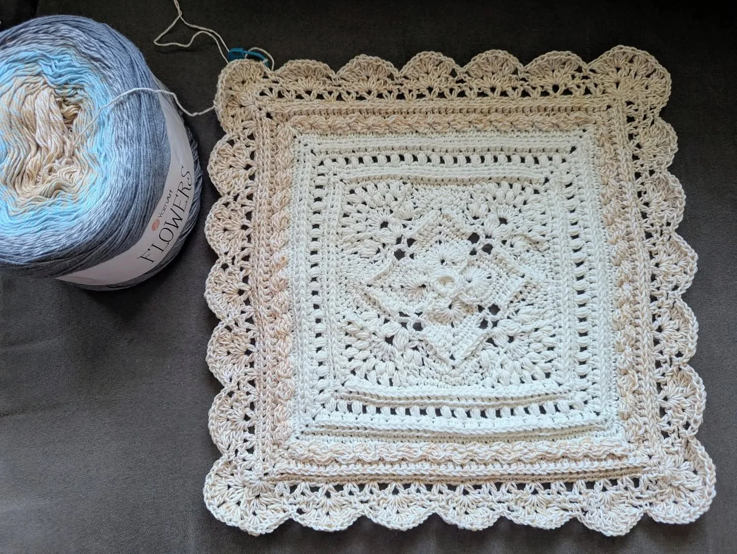 Here's the project I spoke about 2 weeks ago.  I started it Tuesday.  Available when completed.  Baby blanket sized.

If the center square looks familiar it is the same one used in the gray squares blanket.  So much more delicate with a thinner yarn.