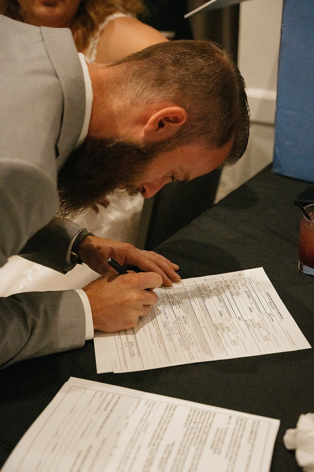 signing marriage cert in Tahoe