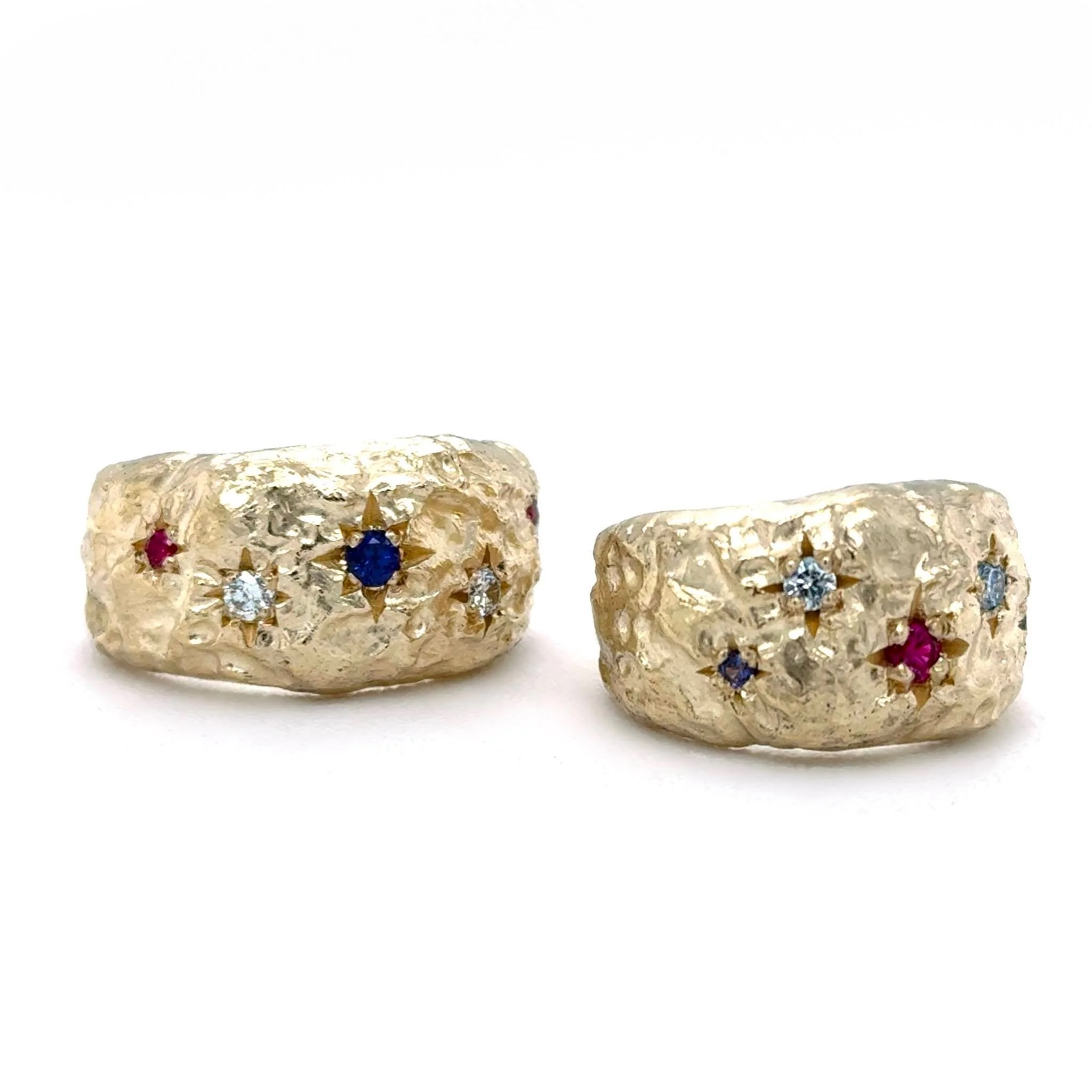 For a longtime customer who has their own fantastic collection of pieces, we needed something really special when it came time for wedding bands! 

When brainstorming design ideas, big, bold, with a heavy textured feel were on the list. A personal to