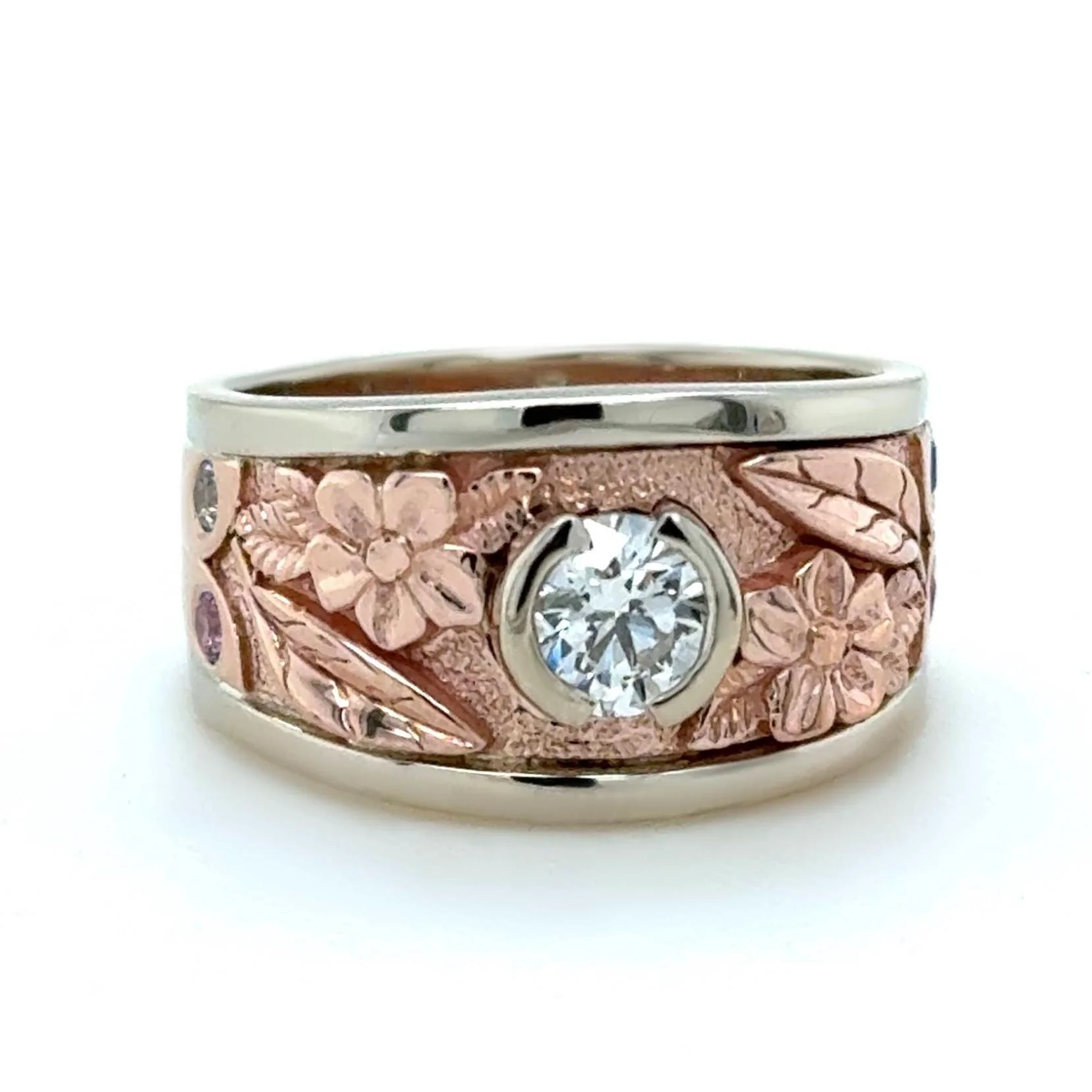 This was a special remake of the customer&rsquo;s original wedding set. We incorporated her polar bear diamond into a completely new custom design, creating a piece that honors the original while giving it a fresh new look. Remaking wedding sets and 