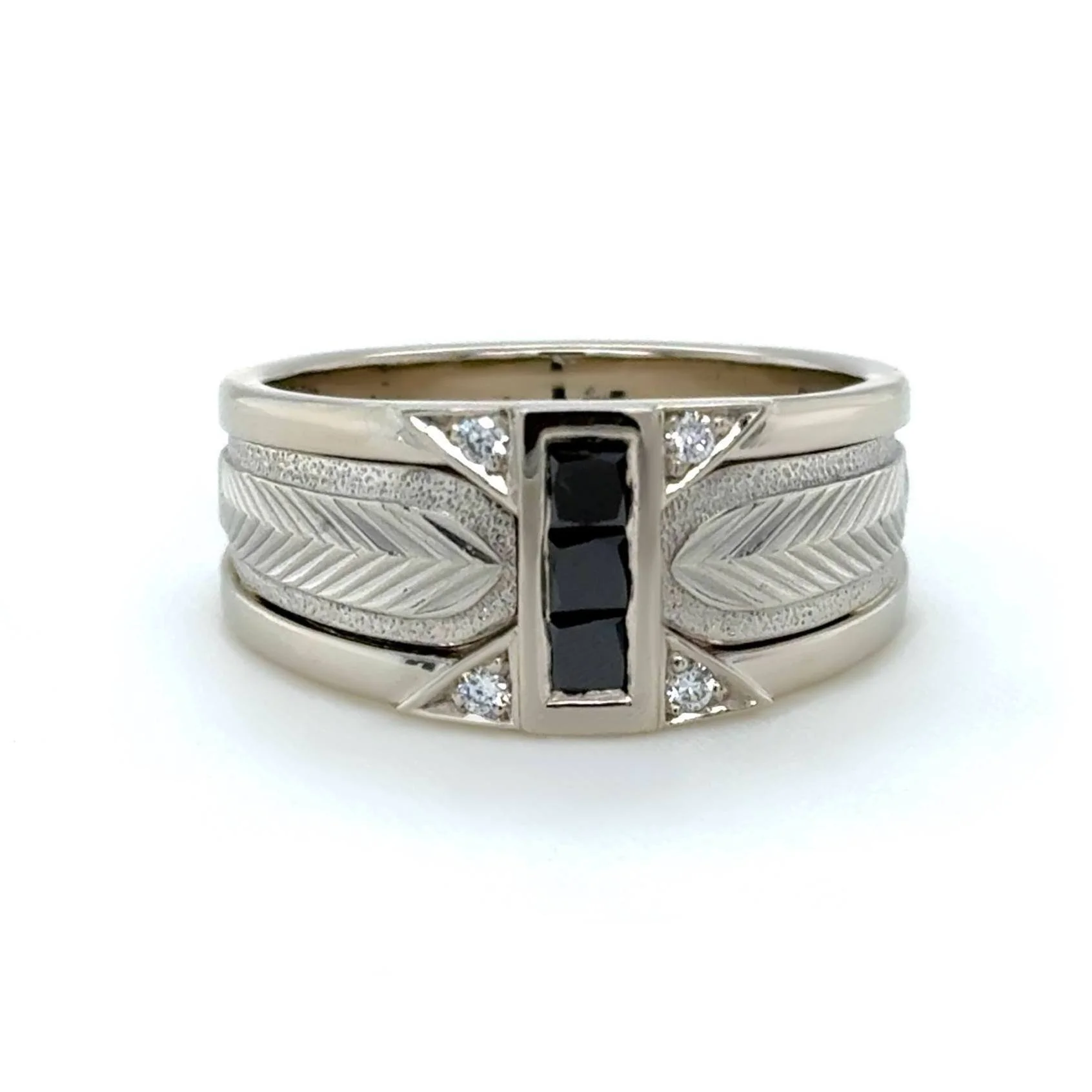 A hardworking man finally getting the ring he deserves. We kept his original wedding band at the center, adding a lot of meaning to this new design. Turned out super cool and made for everyday wear.🖤

 #CustomMadeJewellery #customweddingbands #GoChe