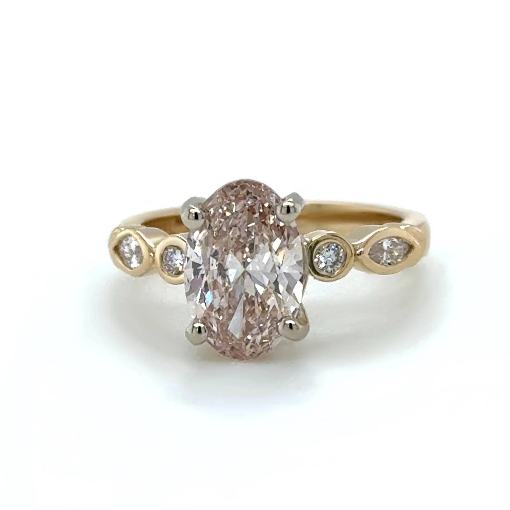 The center pink lab diamond adds a fun and unexpected touch to this wedding set. This piece turned out beautifully and is ready for everyday wear.✨💟

 #LabDiamond #CustomMadeJewellery #QualityIntegrityCraftsmanship #customweddingbands #customjewelle