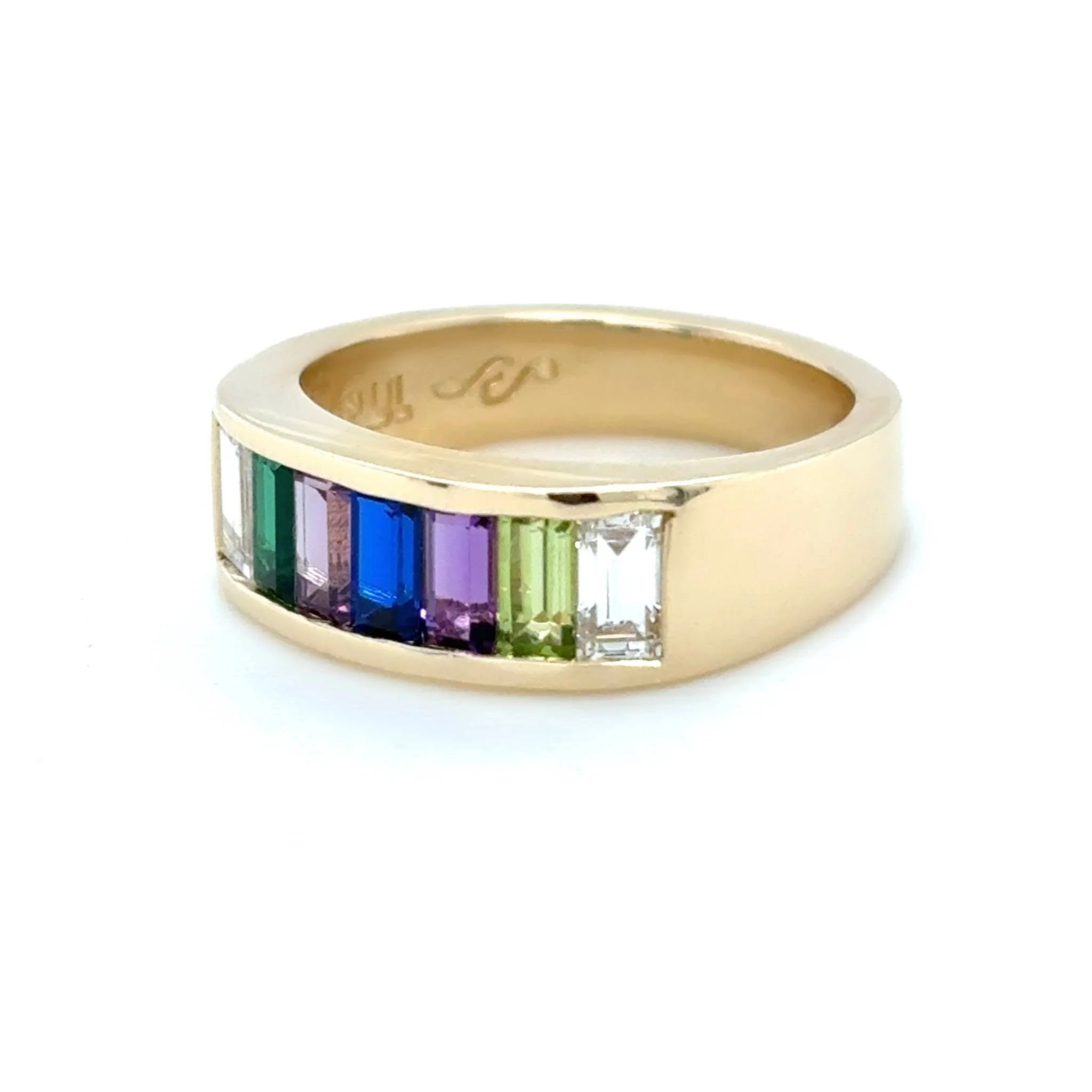 Simple, clean, and meaningful. This family ring features birthstone baguettes to represent the people who mean the most. 💜💚💙

 #QualityIntegrityCraftsmanship #gemstones #CustomMadeJewellery #familyring #Birthstones #madeinhouse #customjewellery #c