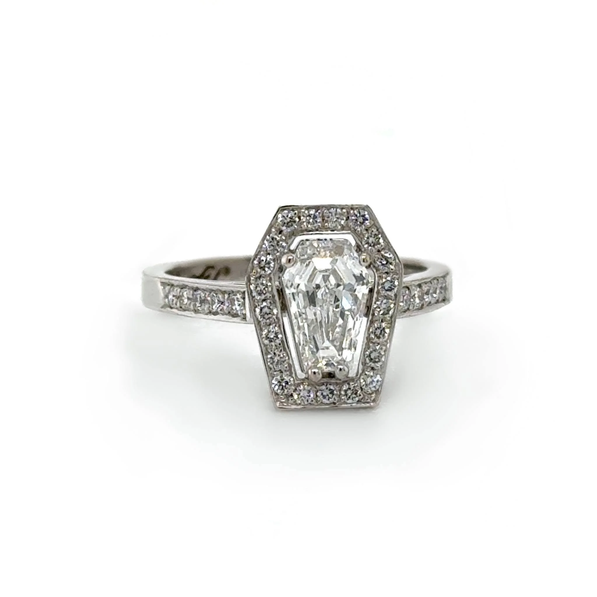 This gothic-inspired ring features a custom cut coffin-shaped lab diamond, made specifically for the design.

Lab-grown diamonds give us some extra flexibility when it comes to creating something truly custom, and this was the perfect opportunity to 