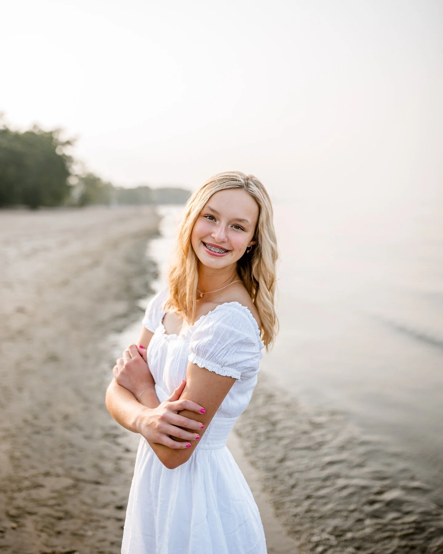 Golden hour + a gorgeous smile = pure magic ✨🌊 I love spring and all... but summer is REALLY where it's at. Book your beach session today before the summer is here and gone!🌞 #summerinmichigan #sweetsummertime #summerphotography #beachphotography #