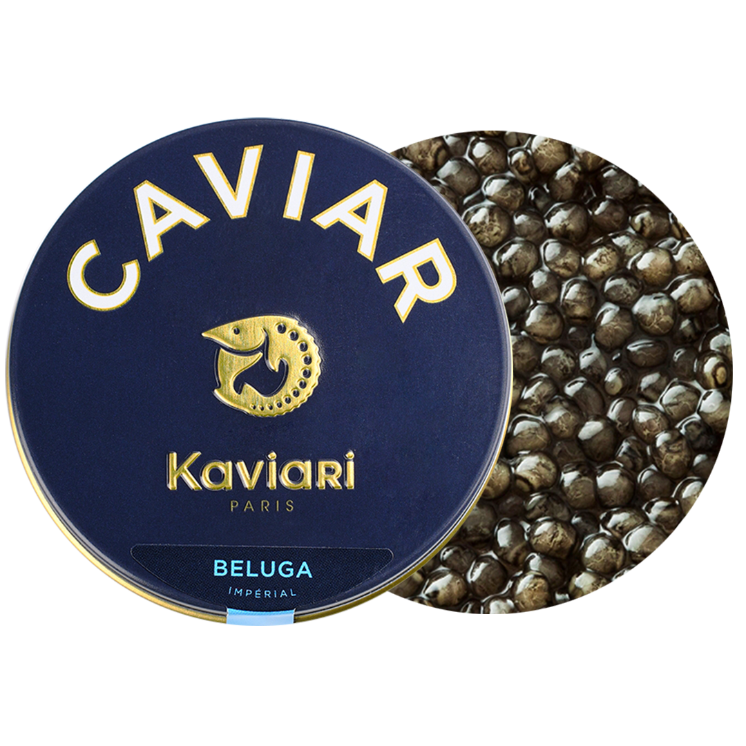 Round tin of Kaviali caviar with a navy blue and gold label, placed beside a pile of black caviar eggs.