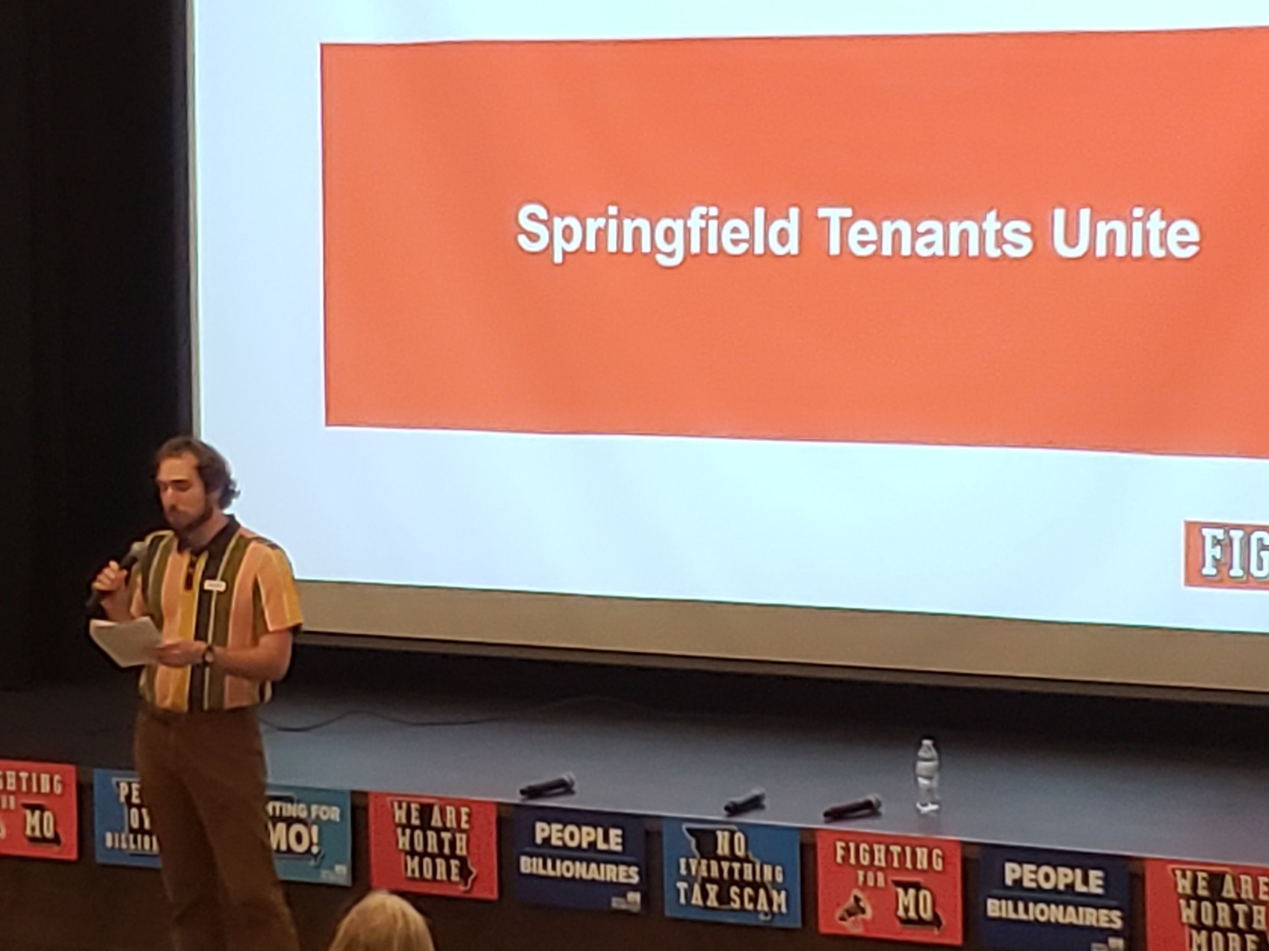 Daniel Behlmann presents on behalf of STUN at the Emergency Mass Meeting. Photo by Karl Reinkemeyer.