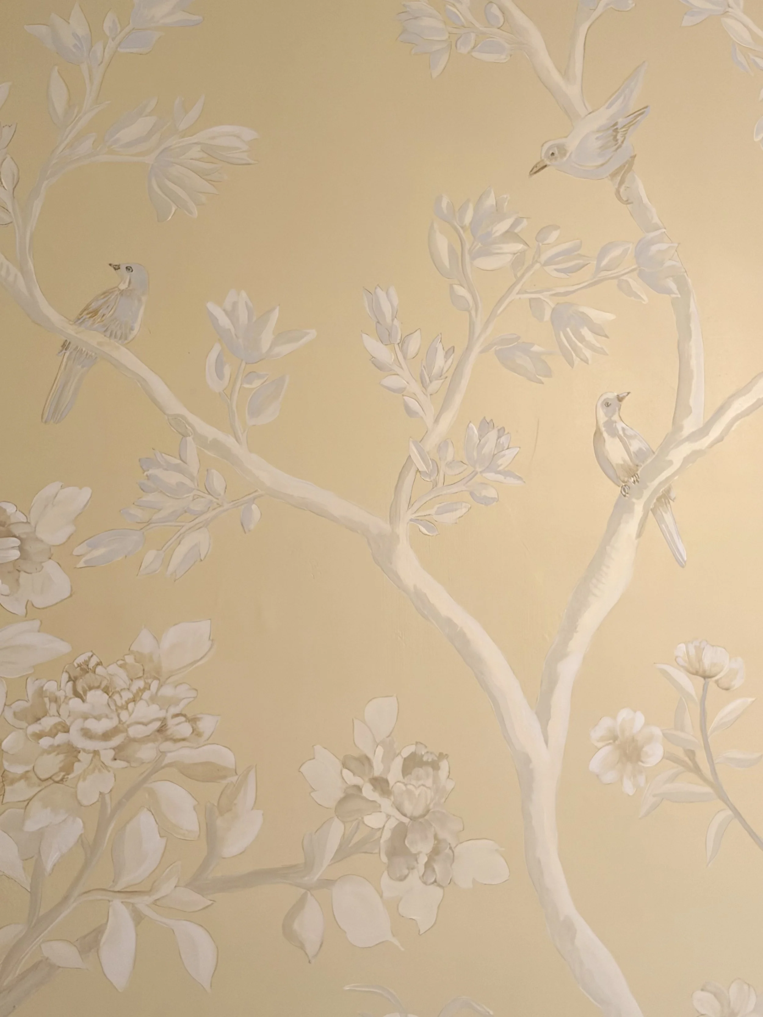 Chinoiserie botanicals and birds in a soft colour palette.