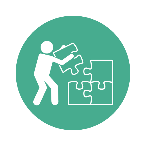 Icon of a person assembling a puzzle, with puzzle pieces scattered around.