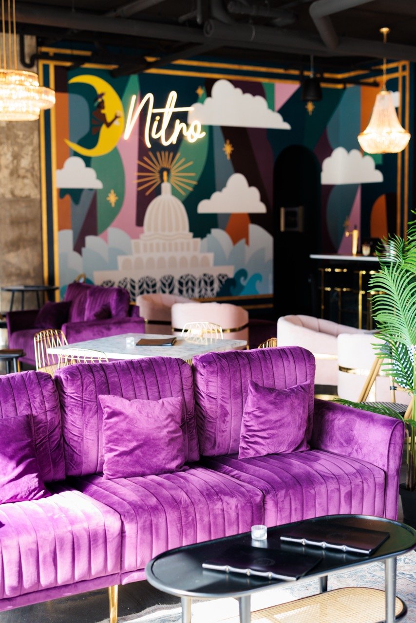 purple couch inside nitro lounge-madison