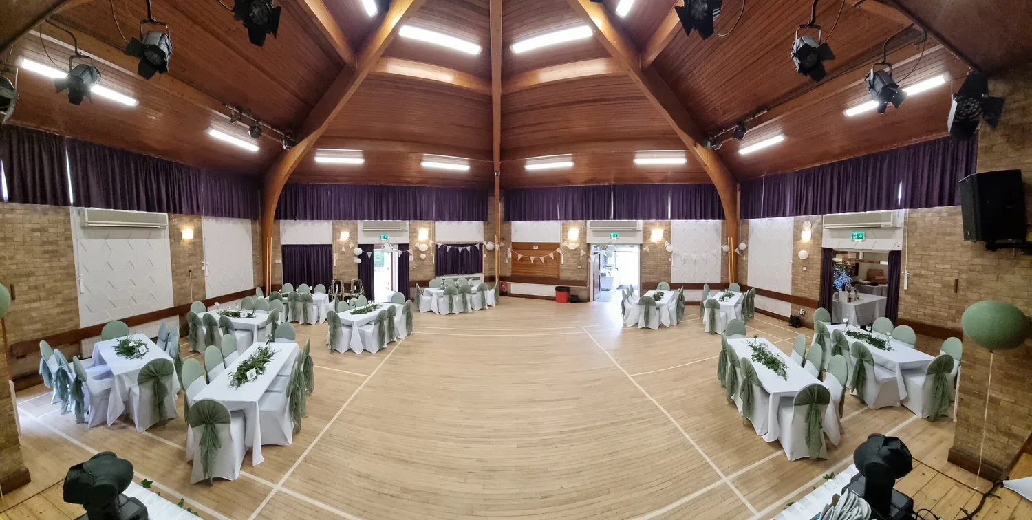 The main hall set out for a wedding reception.