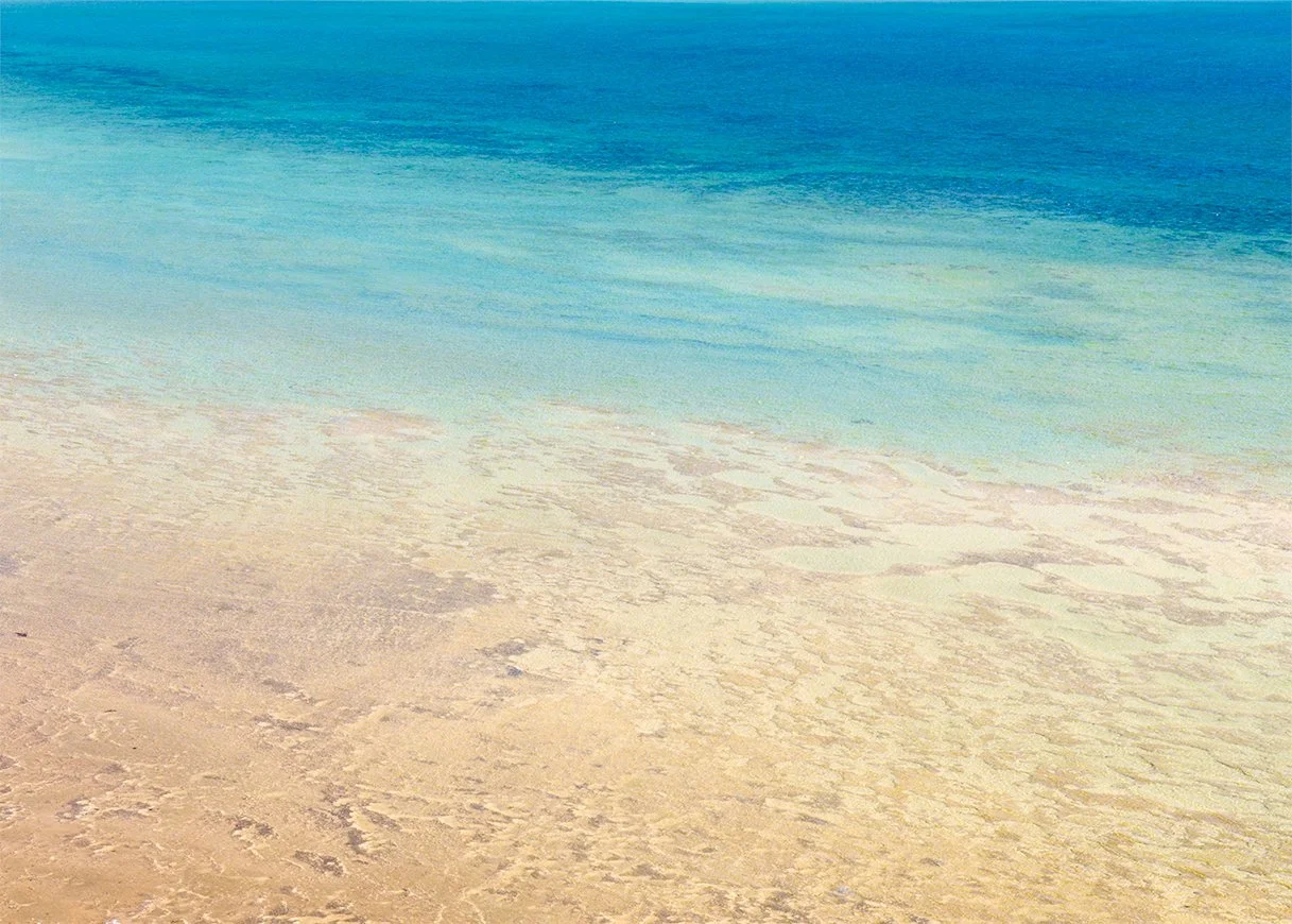 Soft blurred abstract of blue and turquoise waters on the shotres of Gladstone Bay, Western Australia