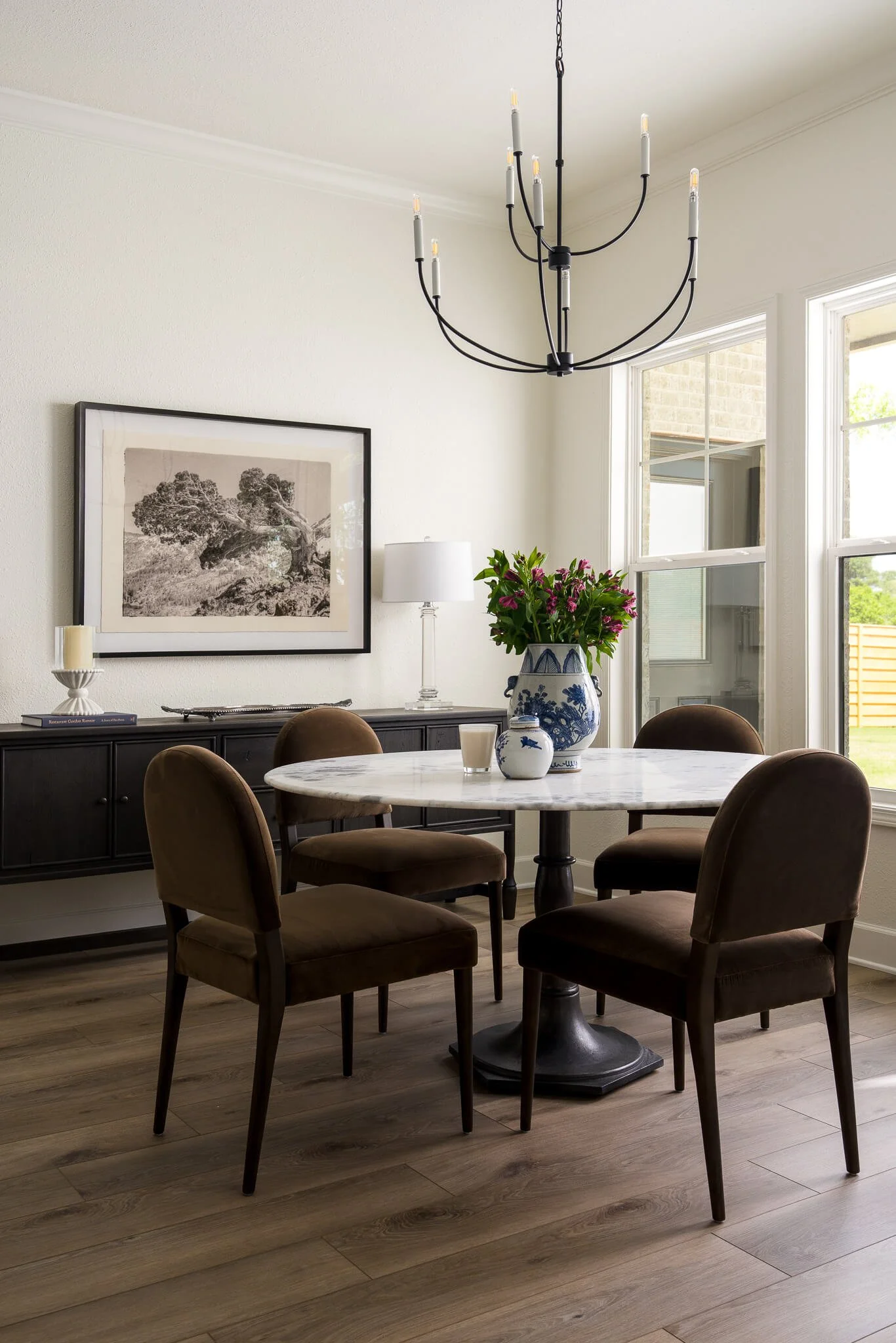 Neutral-toned cottage interior with woven textures and earthy materials by Austin photographer.