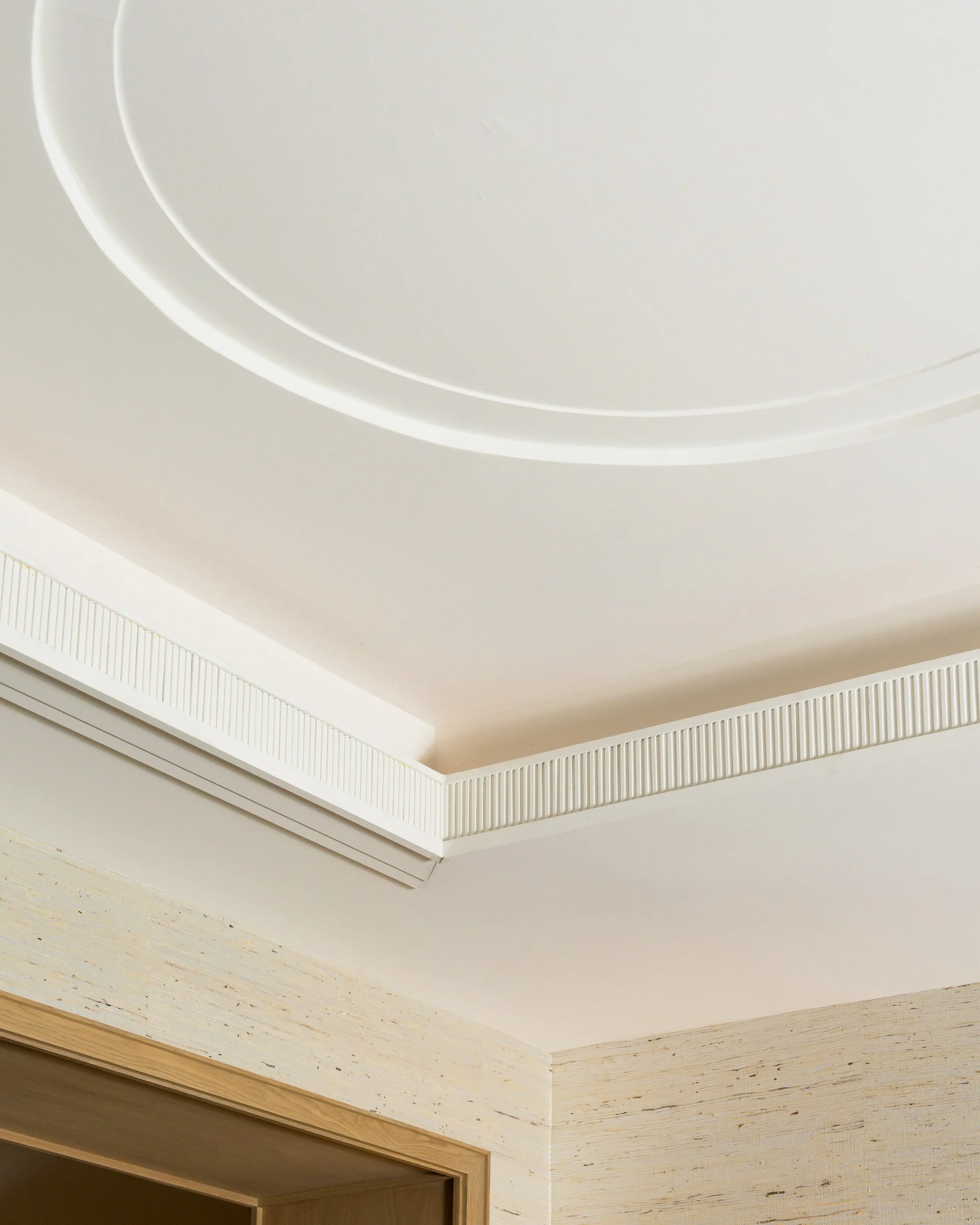 The more interiors I photograph, the more I notice recurring ideas.

Lately, it&rsquo;s been curves.

Not just in architecture, but in the furniture, millwork, and the small details that shape how a space looks.

Different projects. Different designe