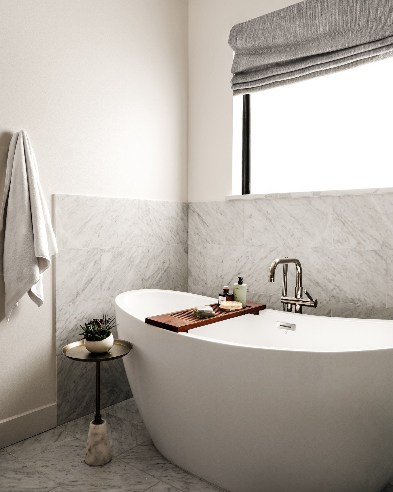 Primary Bathroom Reveal | East Dallas, Texas

@jrzdesignco understood the assignment with this marble chevron running all the way through the shower. The rest of the bathroom keeps things beautifully restrained with marble wainscoting, polished nicke