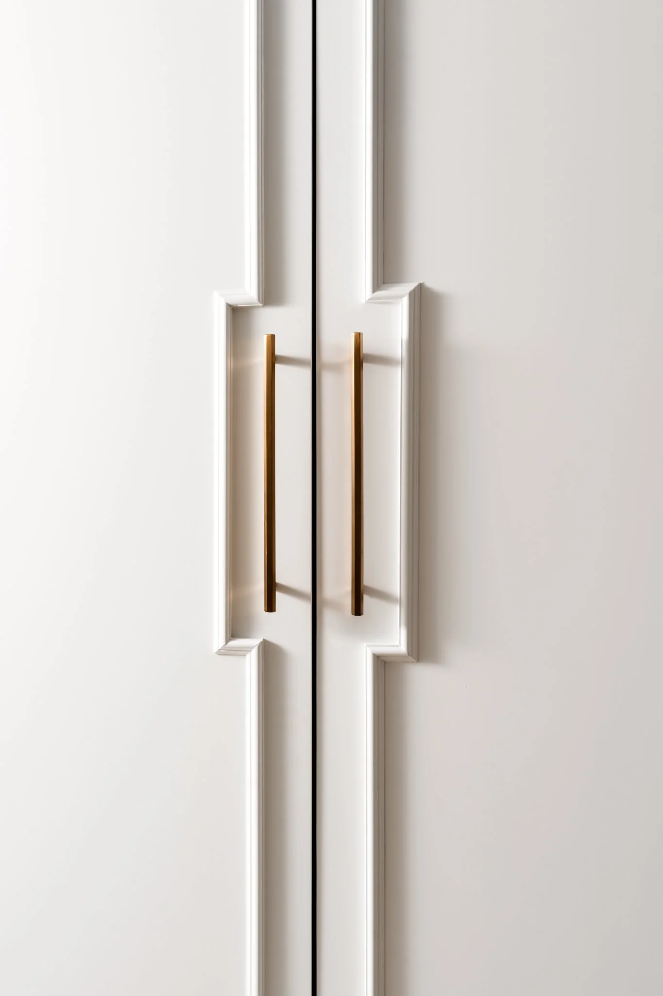 white-cabinetry-brass-hardware-interior-detail.jpg