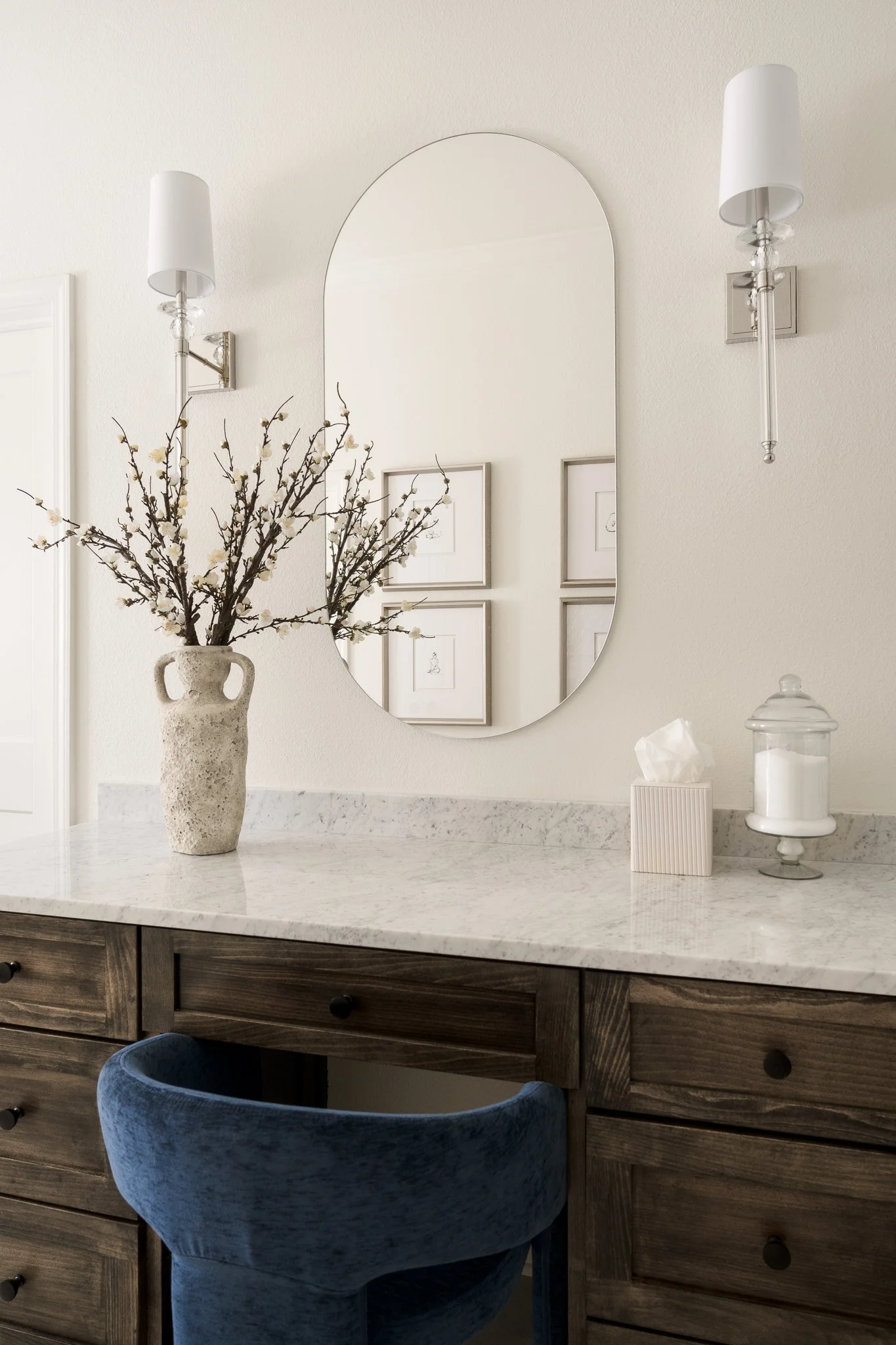 Bright cottage bathroom with traditional vanity and rustic details in Austin home.
