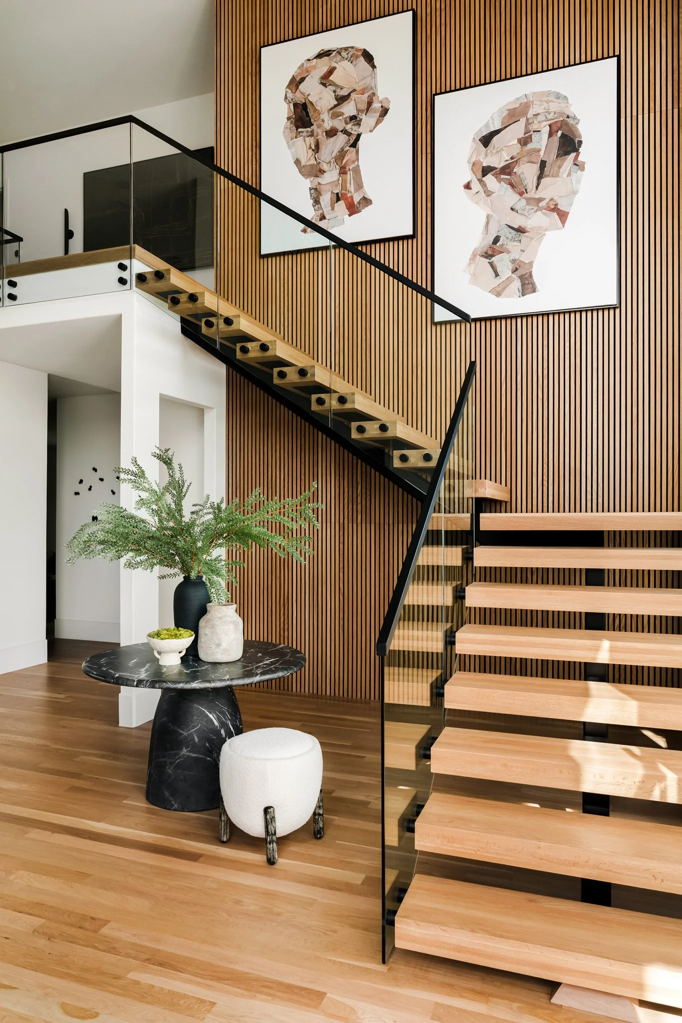 Colorful commercial apartment complex amenity suite featuring orange walls, cowbody art, and colorful furniture. Dallas Apartment Photographer 