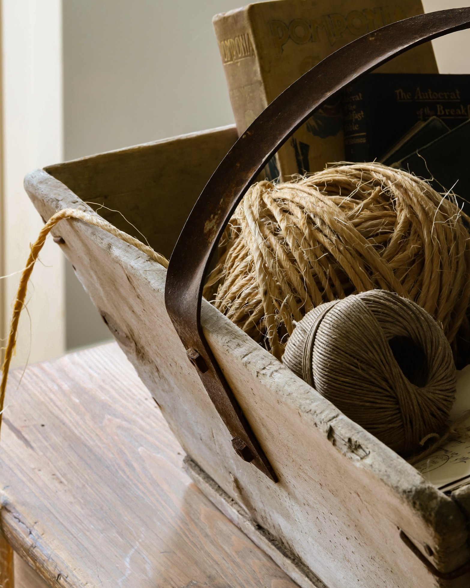 Antique French farmhouse trug on a rustic table