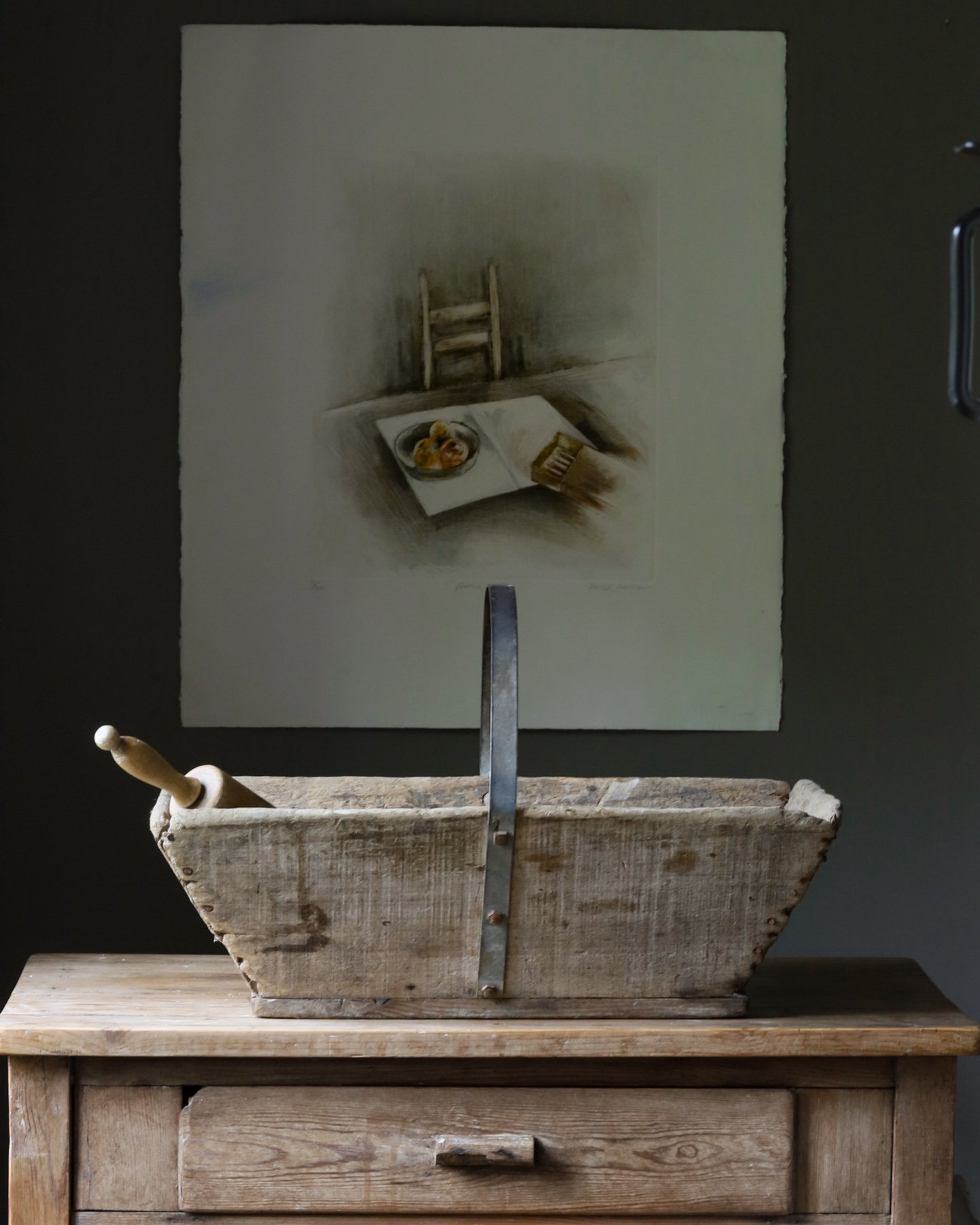 Rustic antique French farmhouse trug on a vintage table