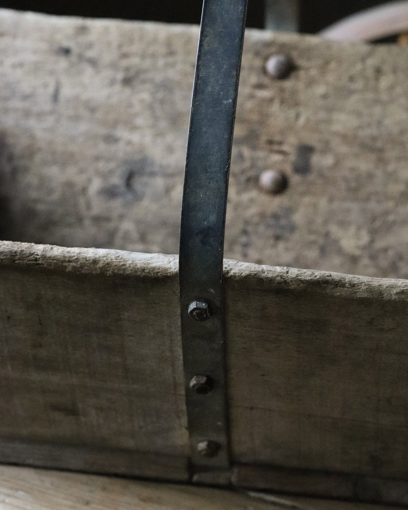 Detail angle of a wooden antique French farmhouse trug