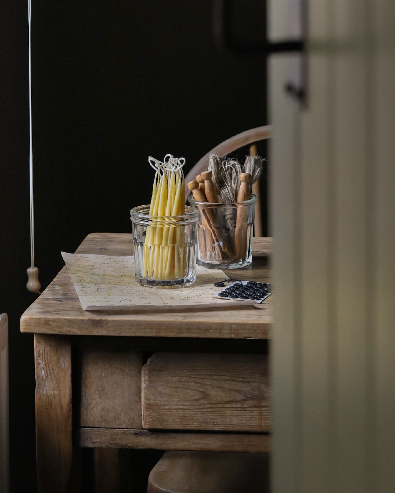 Beeswax celebration candles in a glass jar