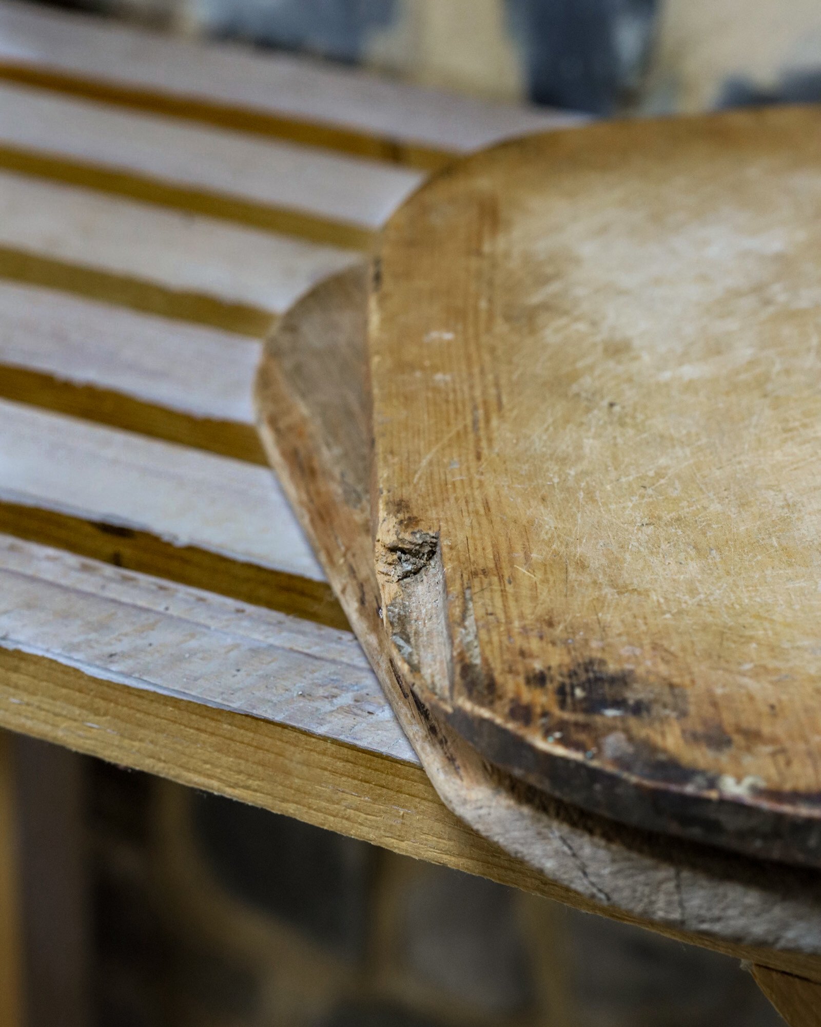 A rustic breadboard on a table