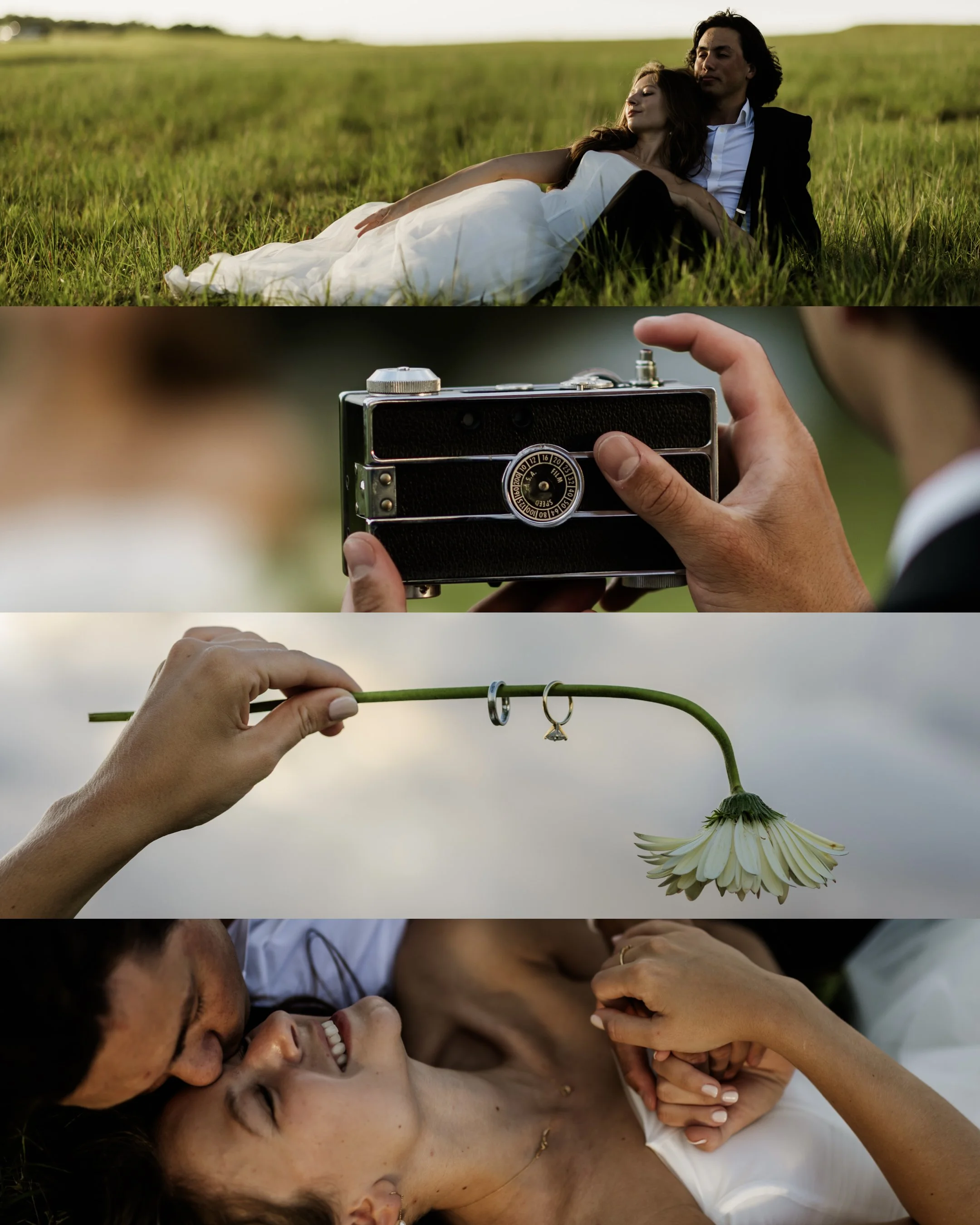 A couple lying on the grass in a field, with the woman in a white dress and the man in a black suit, holding a camera and a white flower.